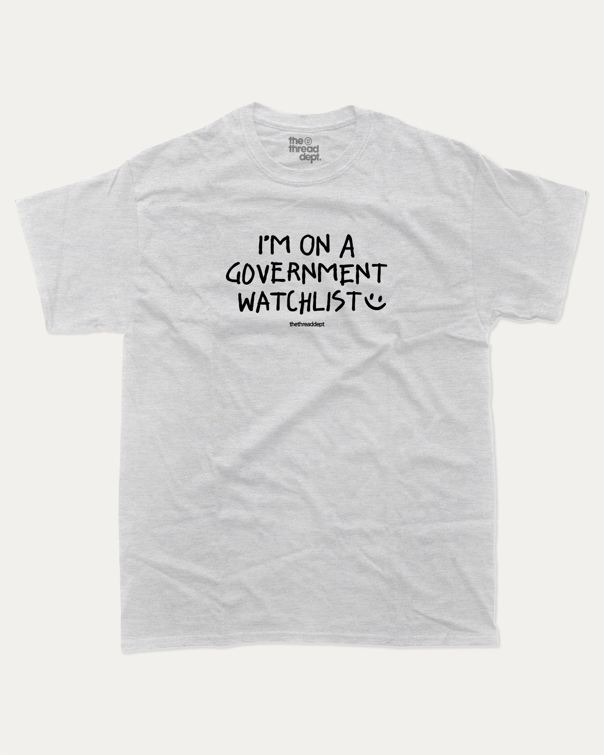 I'm on a government watchlist graphic tee with bold and humorous print, funny and trendy graphic. Perfect for adults and gift-giving. Ash Grey shirt.