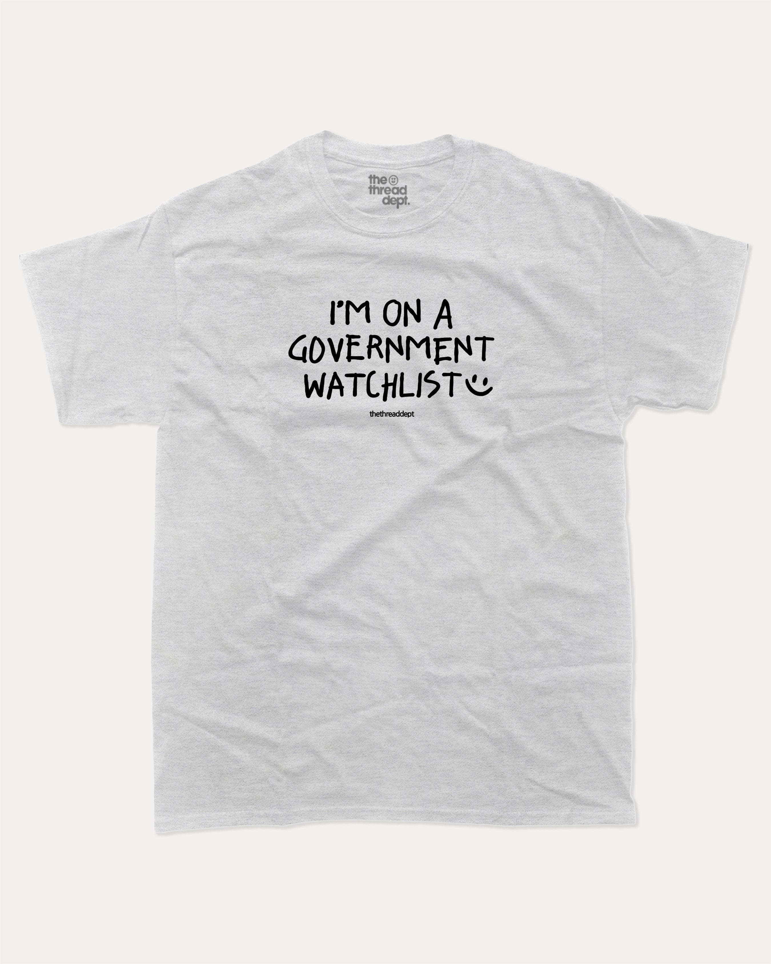 I'm on a government watchlist graphic tee with bold and humorous print, funny and trendy graphic. Perfect for adults and gift-giving. Ash Grey shirt.