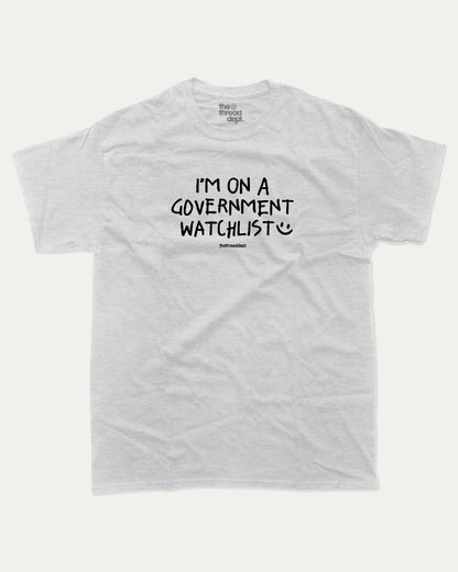 I'm on a government watchlist graphic tee with bold and humorous print, funny and trendy graphic. Perfect for adults and gift-giving. Ash Grey shirt.