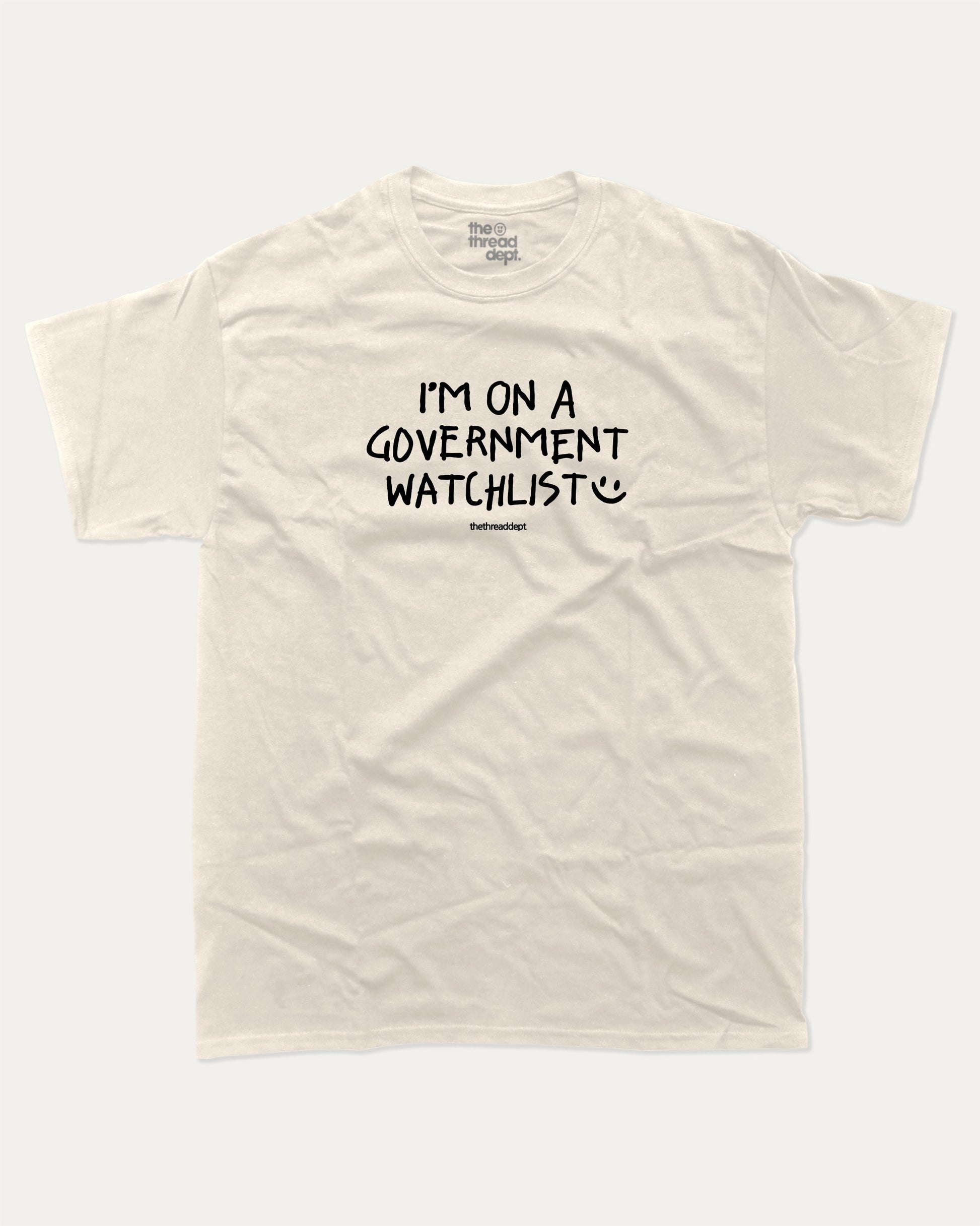 I'm on a government watchlist graphic tee with bold and humorous print, funny and trendy graphic. Perfect for adults and gift-giving. Cream shirt.