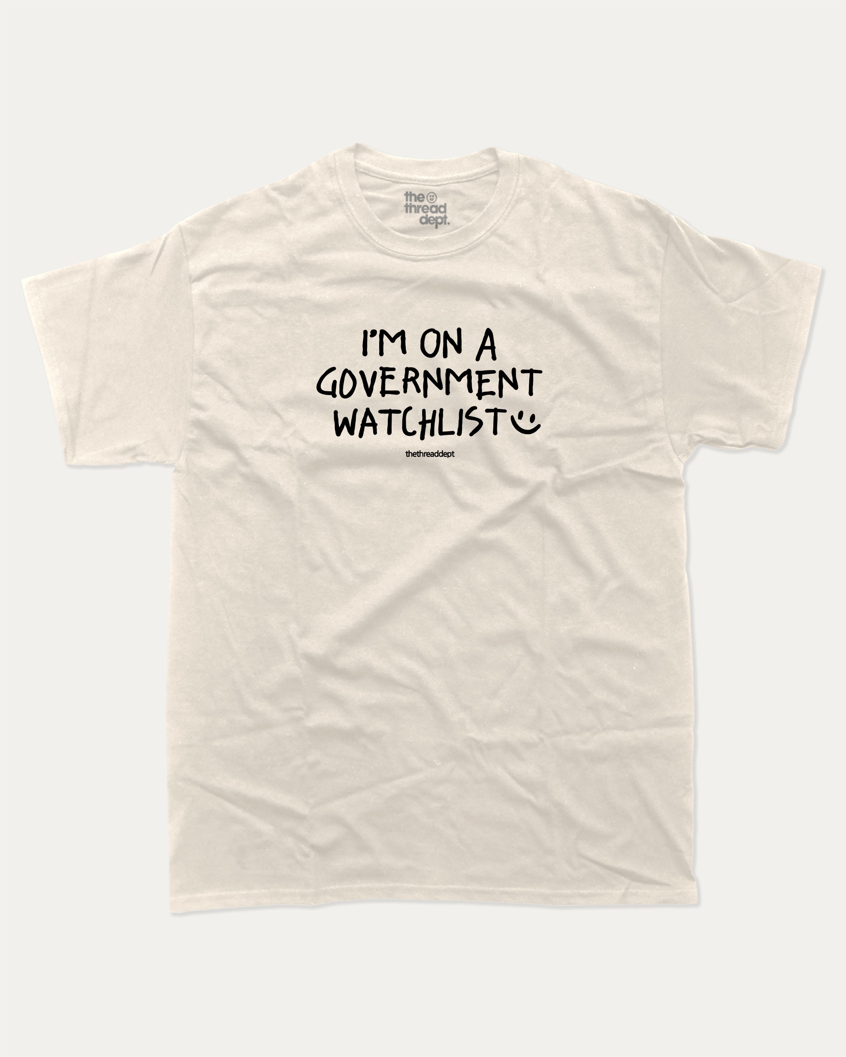 I'm on a government watchlist graphic tee with bold and humorous print, funny and trendy graphic. Perfect for adults and gift-giving. Cream shirt.