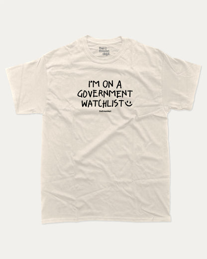 I'm on a government watchlist graphic tee with bold and humorous print, funny and trendy graphic. Perfect for adults and gift-giving. Cream shirt.