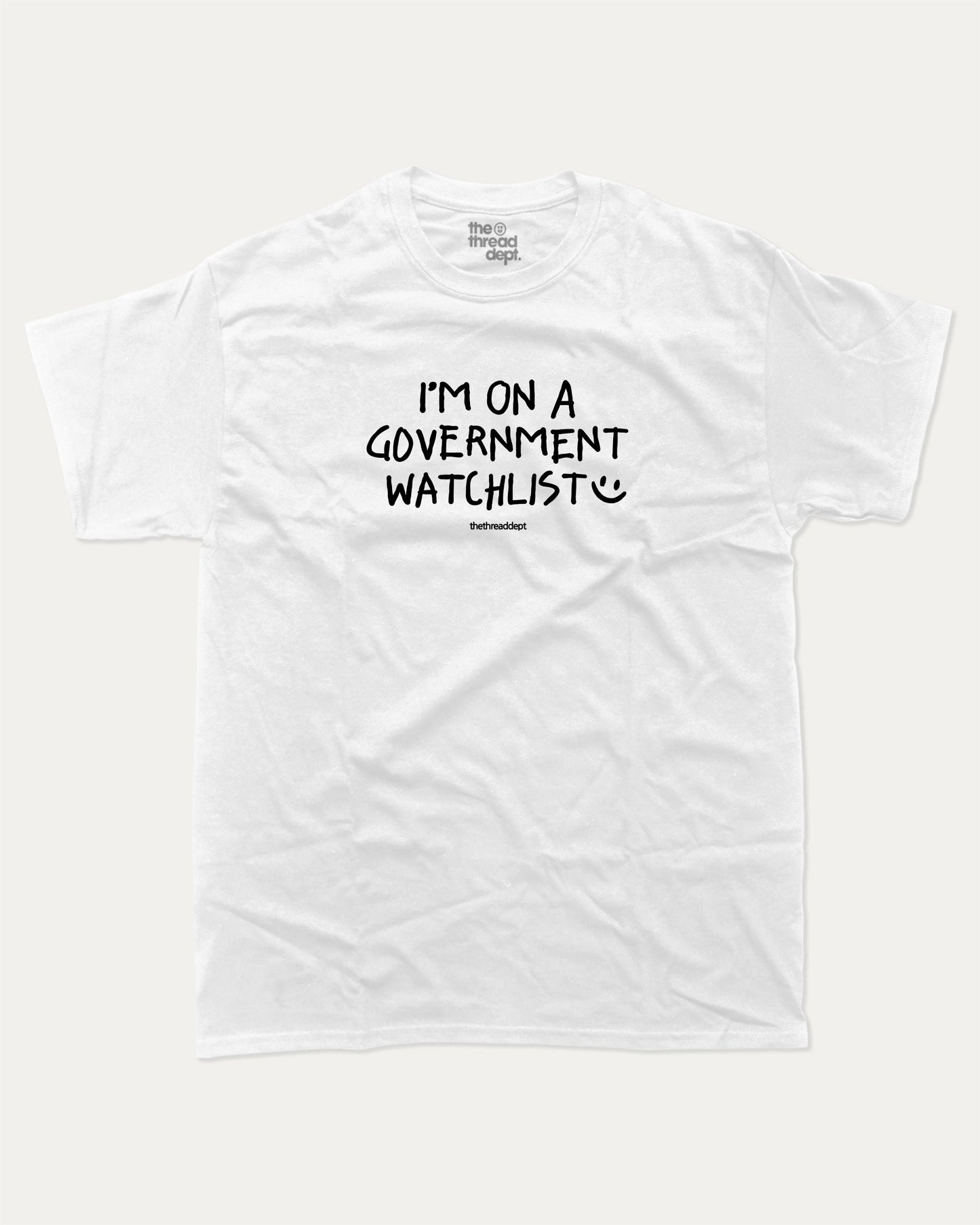 I'm on a government watchlist graphic tee with bold and humorous print, funny and trendy graphic. Perfect for adults and gift-giving. White shirt.