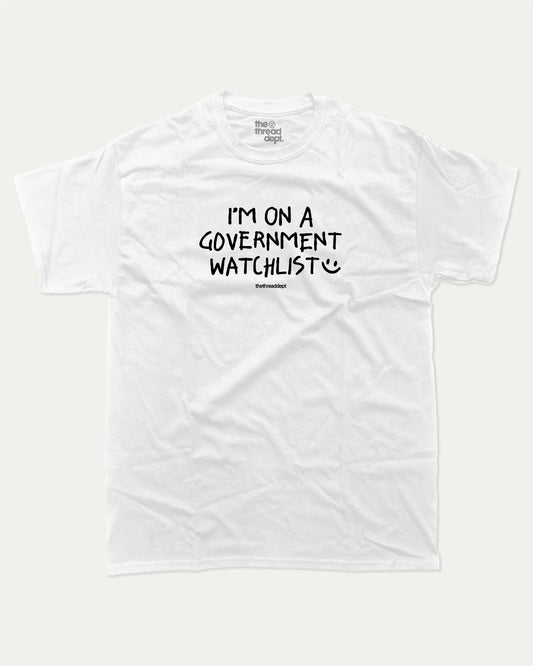 I'm on a government watchlist graphic tee with bold and humorous print, funny and trendy graphic. Perfect for adults and gift-giving. White shirt.