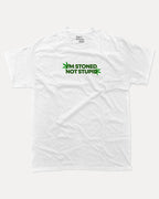 I'm stoned not stupid graphic tee with bold and humorous print, Weed Graphic T shirt, Cannabis Graphic T shirt, Marijuana Graphic T shirt, funny and trendy graphic. Perfect for adults and gift-giving. White shirt.