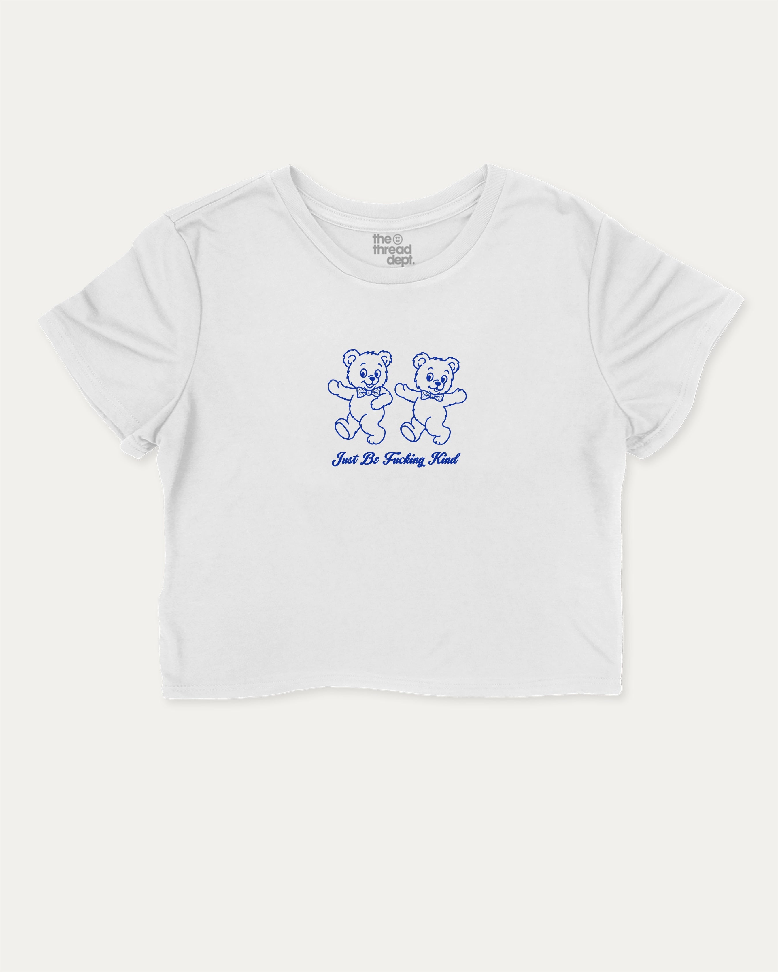 Just Be Kind graphic crop tee with funny and trendy slogan print, perfect for women’s casual looks or layering. White crop t-shirt.