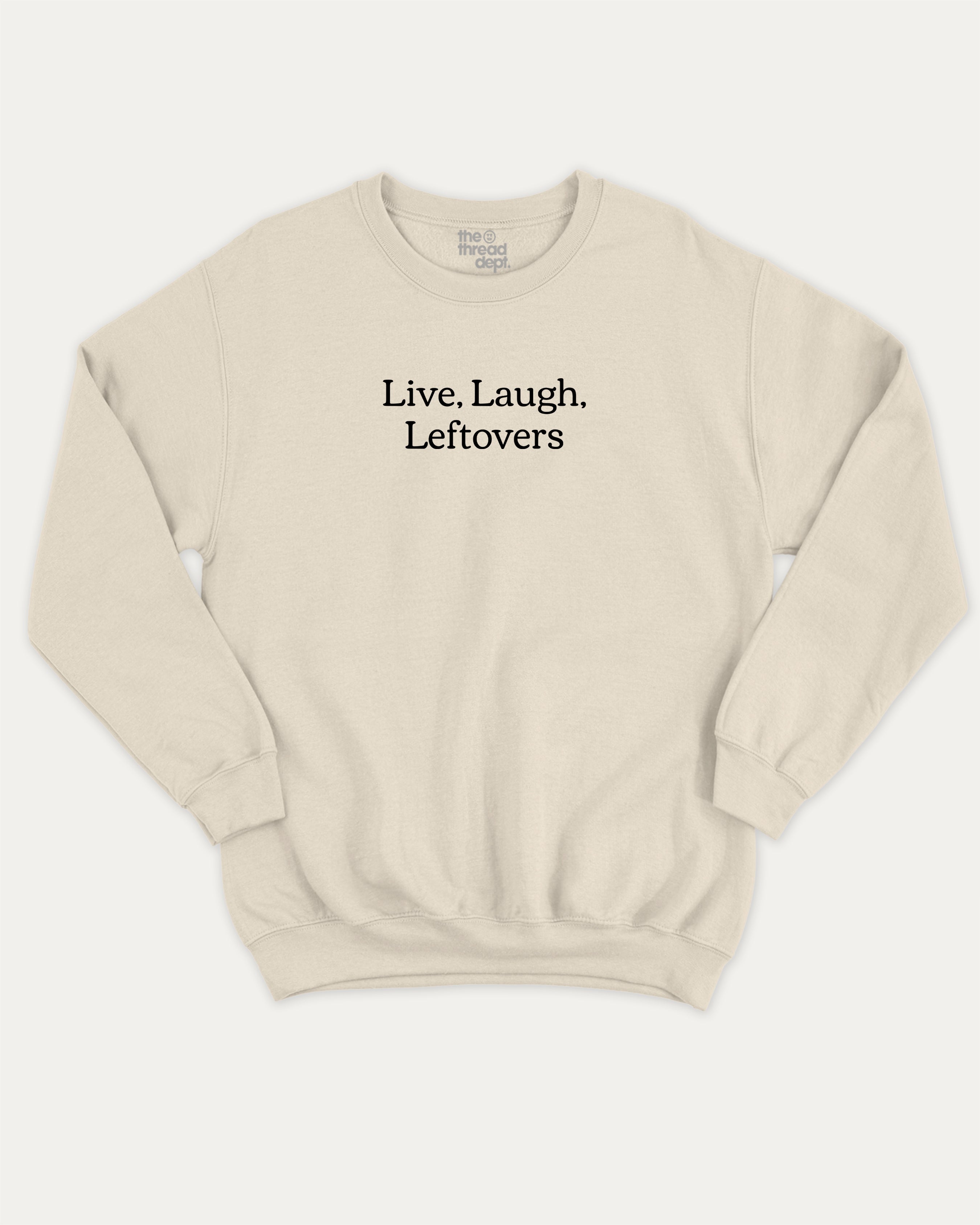 Live Laugh Leftovers graphic sweatshirt with bold and humorous saying print, warm and cozy graphic for everyday wear. Perfect for adults and gift-giving. Natural pullover.