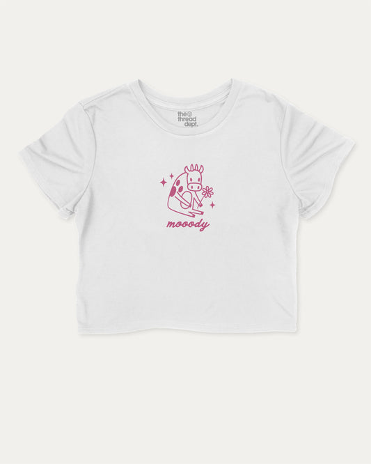 Mooody Cow cute and trendy crop tee with cow graphic, perfect for women. A must-have cropped aesthetic shirt, ideal for daily outfits and casual days. White crop tee