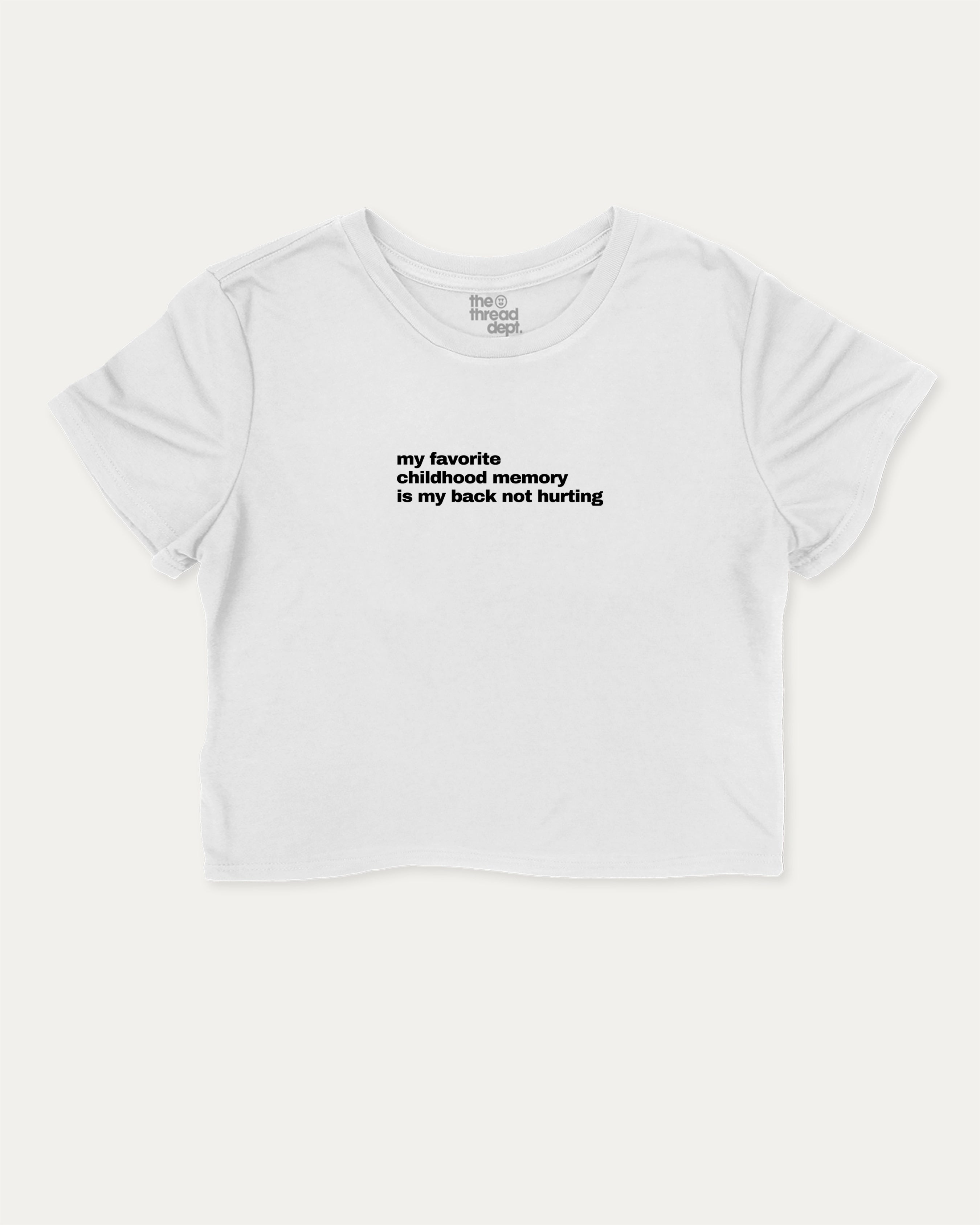My Favorite Childhood Memory Is My Back Not Hurting graphic crop tee with funny and trendy slogan print, perfect for women_ casual looks or layering. White crop t-shirt.