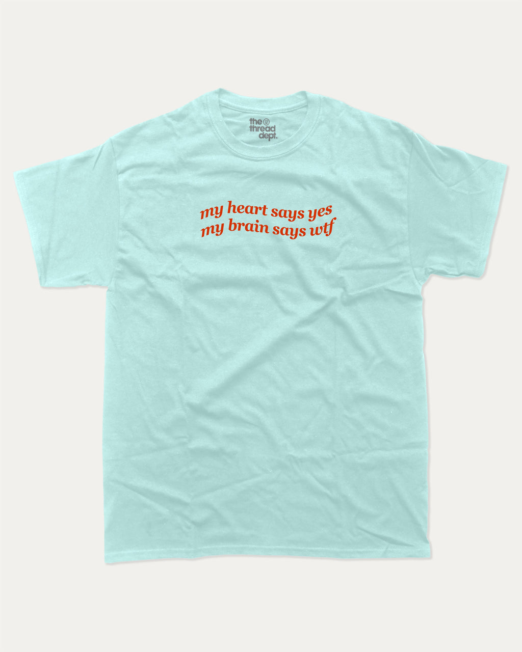 my heart says yes my brain says wtf graphic tee with bold and humorous print, funny and trendy graphic. Perfect for adults and gift-giving. Celadon shirt.