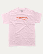 my heart says yes my brain says wtf graphic tee with bold and humorous print, funny and trendy graphic. Perfect for adults and gift-giving. Pink shirt.