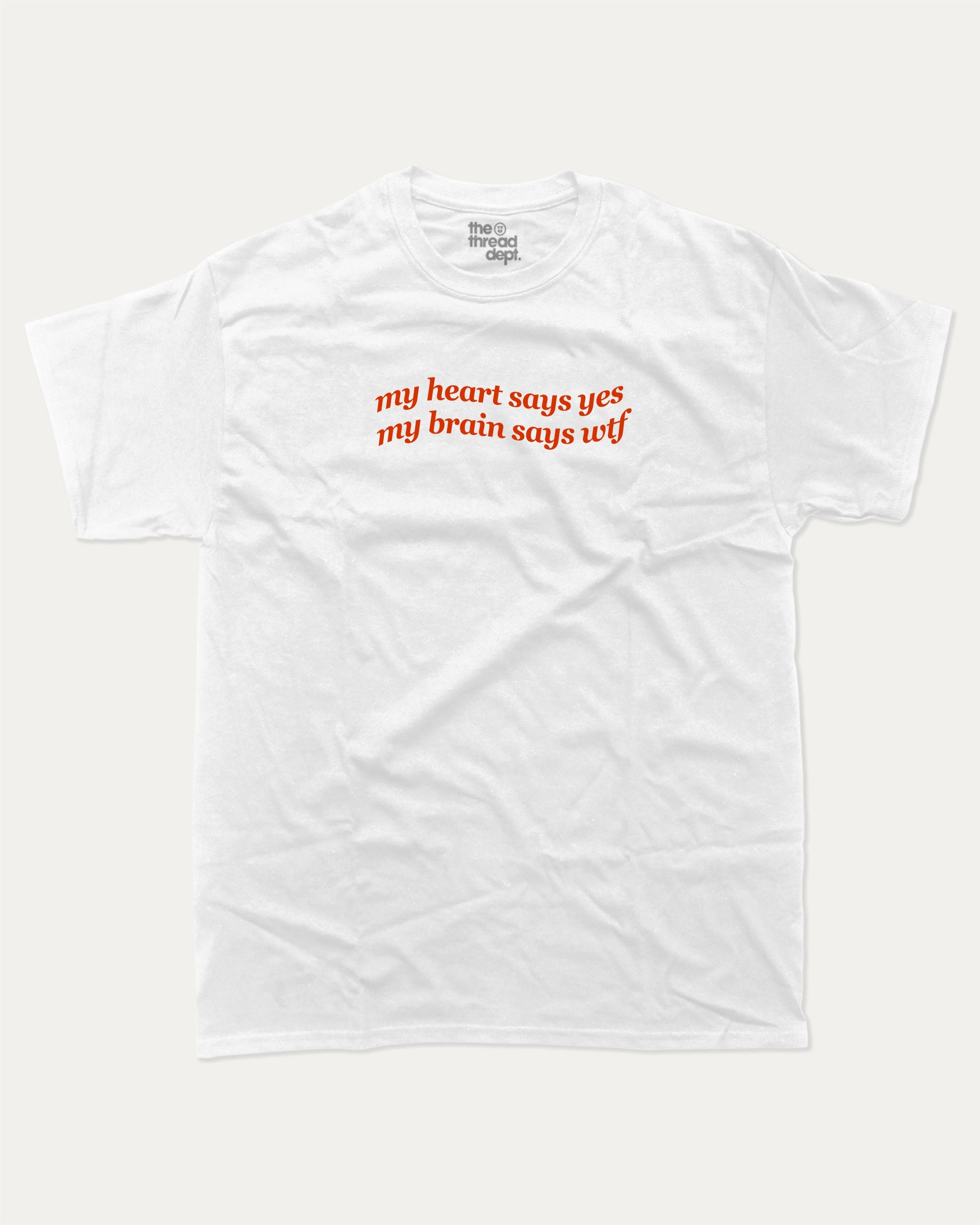 my heart says yes my brain says wtf graphic tee with bold and humorous print, funny and trendy graphic. Perfect for adults and gift-giving. White shirt.