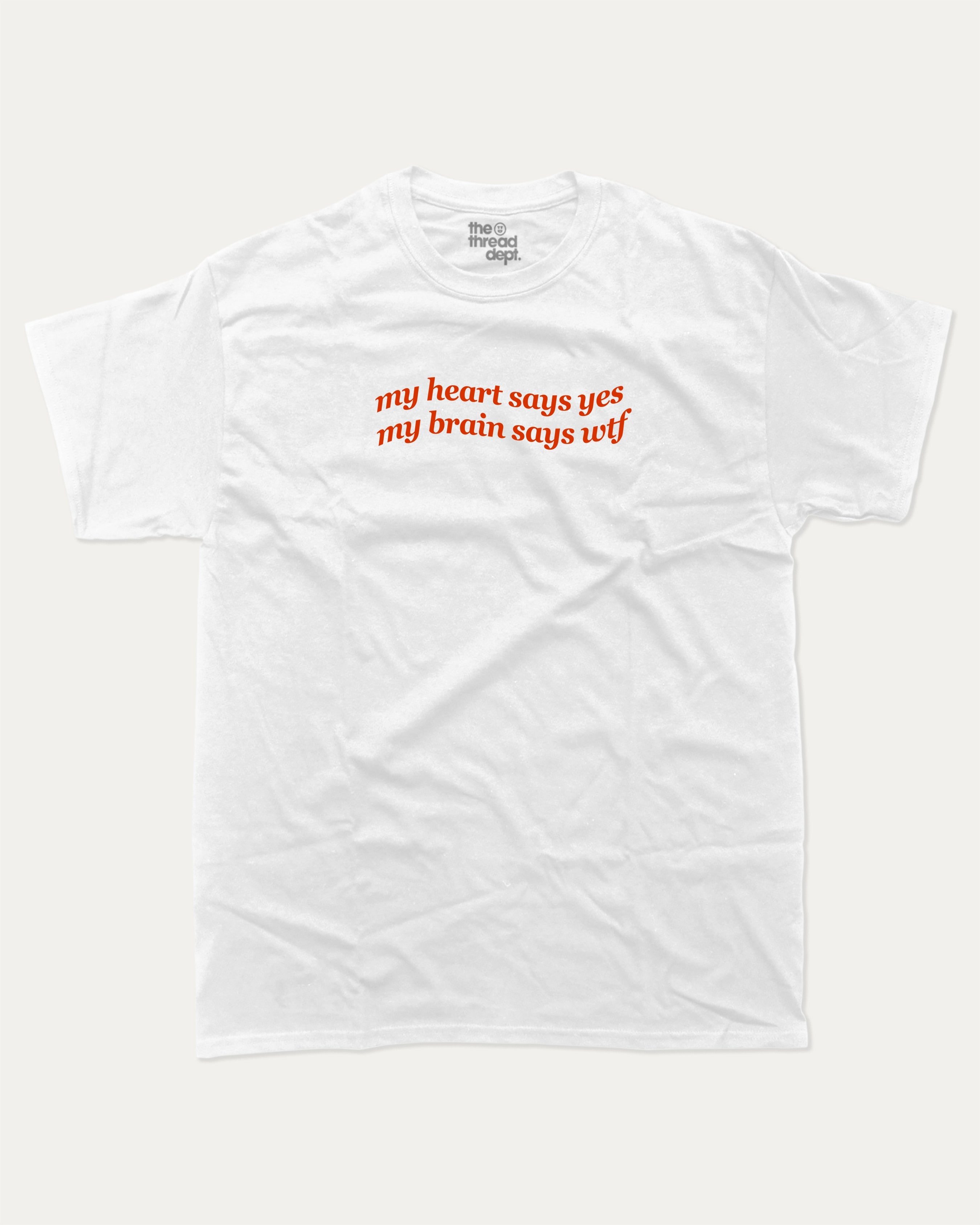 my heart says yes my brain says wtf graphic tee with bold and humorous print, funny and trendy graphic. Perfect for adults and gift-giving. White shirt.