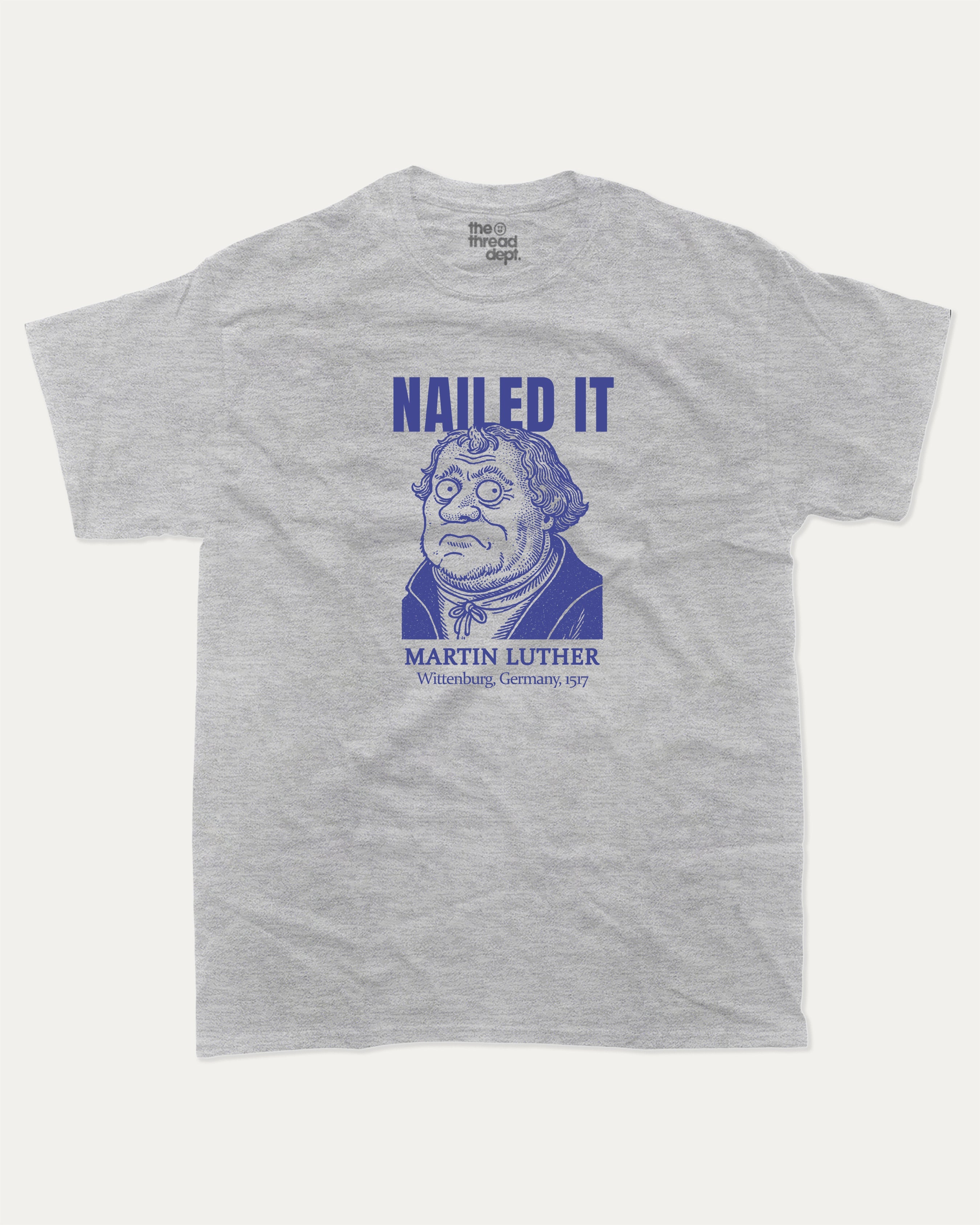 Nailed It graphic tee with bold and humorous print, Funny Historic Figure Graphic T shirt, Martin Luther Graphic T shirt, Funny Martin Luther Tee, funny and trendy graphic. Perfect for adults and gift-giving. Heather Grey shirt.