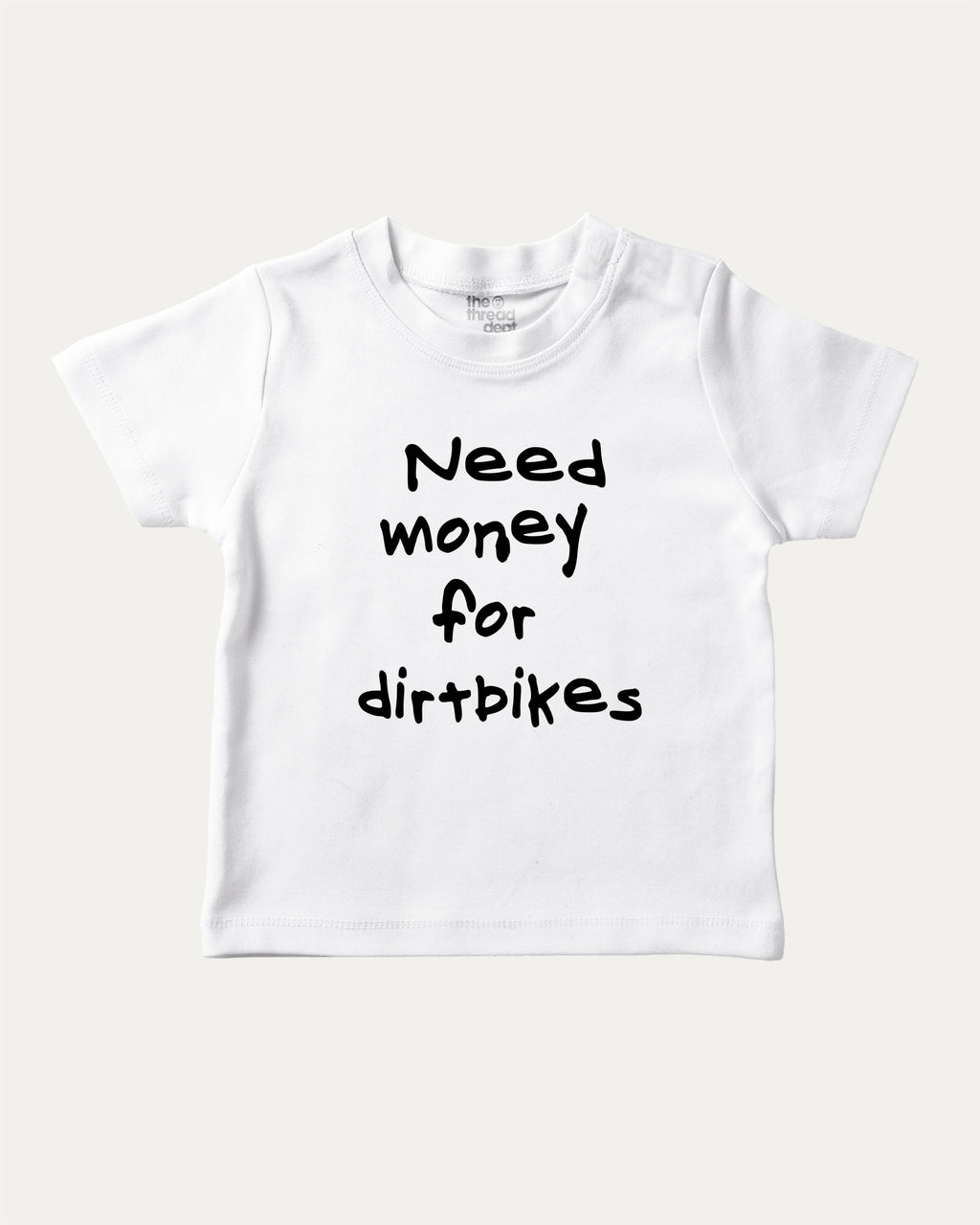 Need Money For Dirtbikes graphic tee with bold and humorous print, funny baby shirt. Perfect for adults and gift-giving. White shirt.