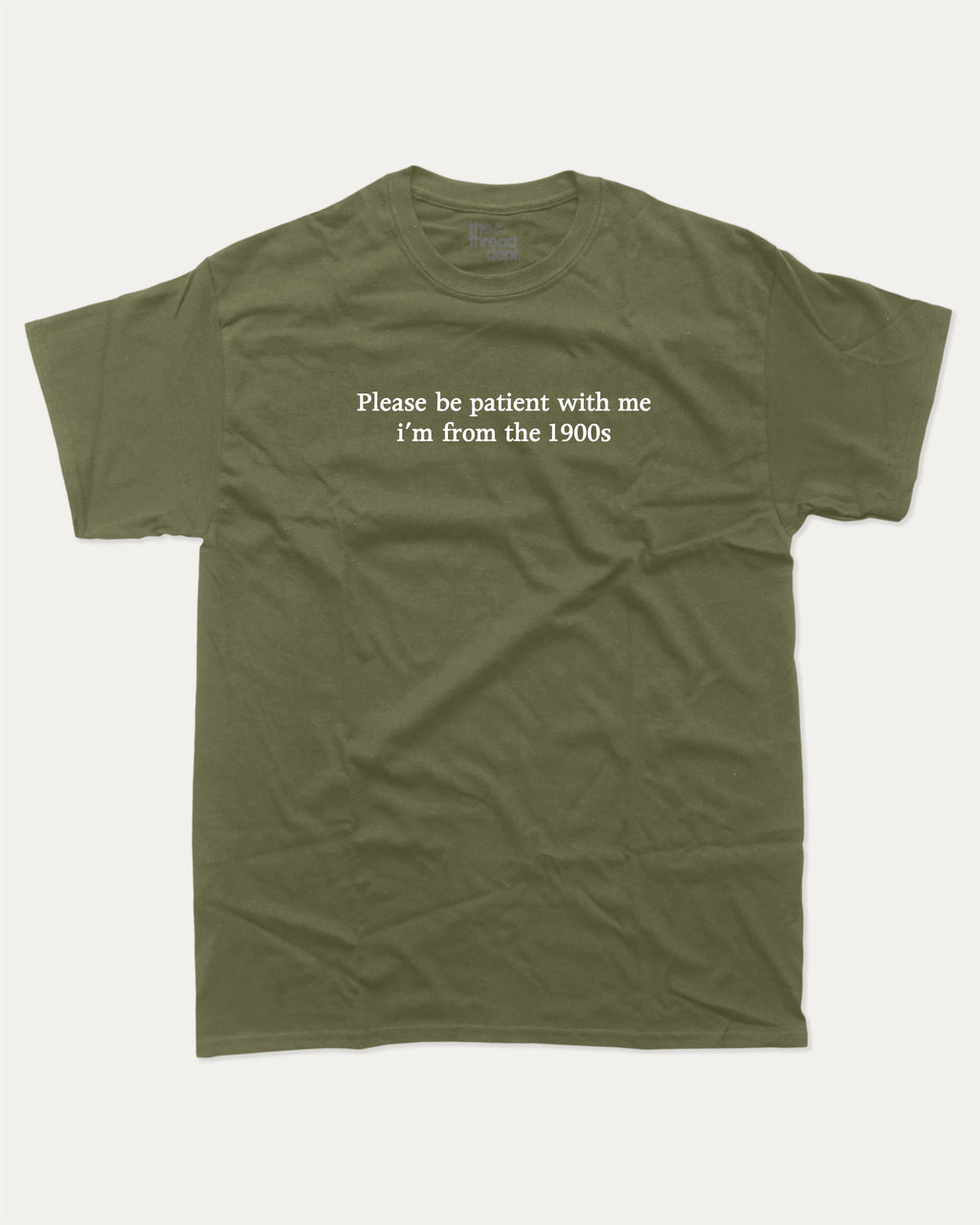 Please Be Patient With Me I'm From The 1900s graphic tee with retro and humorous print, funny and trendy graphic. Perfect for adults and gift-giving. Military Green shirt.