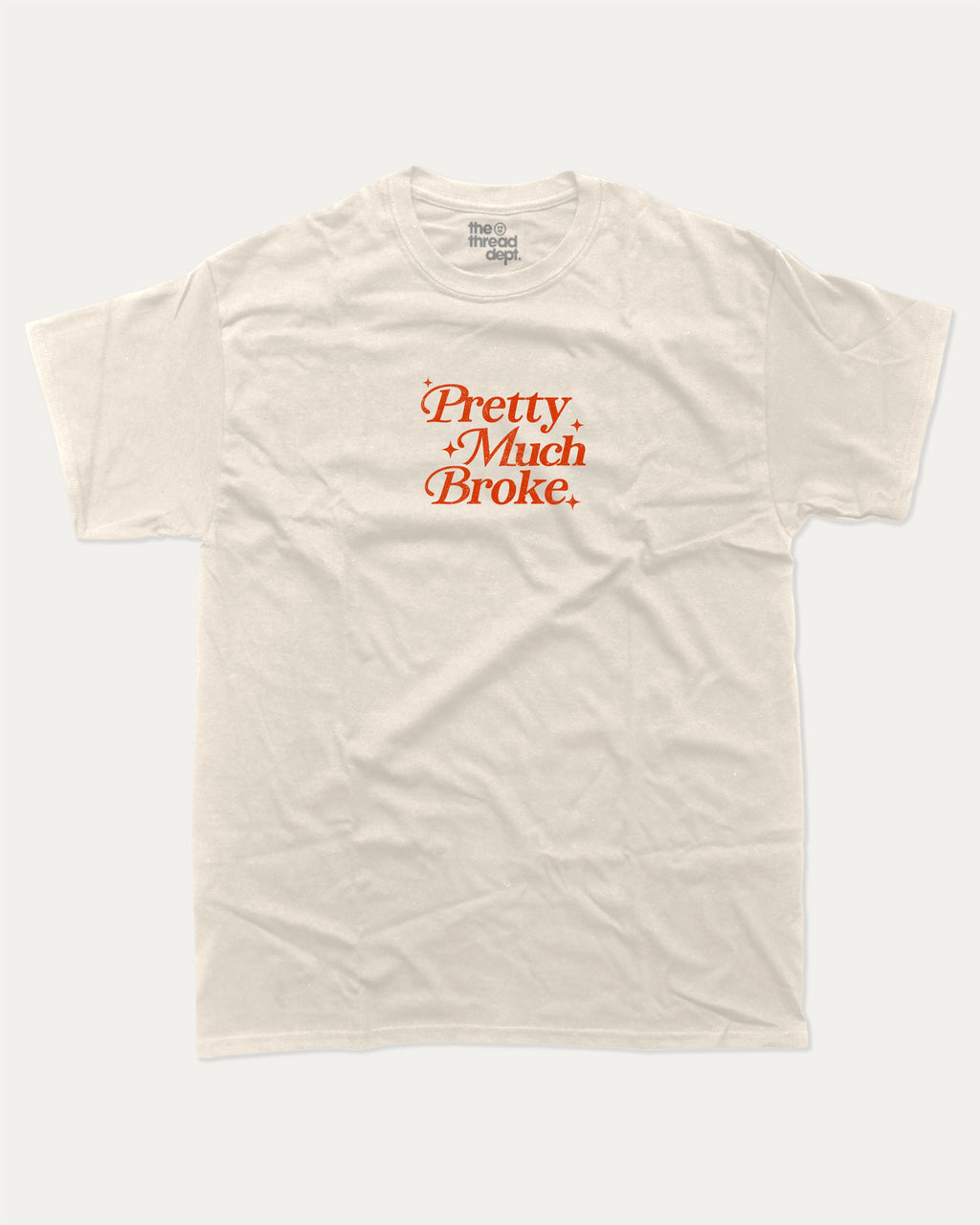 Pretty Much Broke graphic tee with bold and humorous print, funny and trendy graphic. Perfect for adults and gift-giving. Cream shirt.