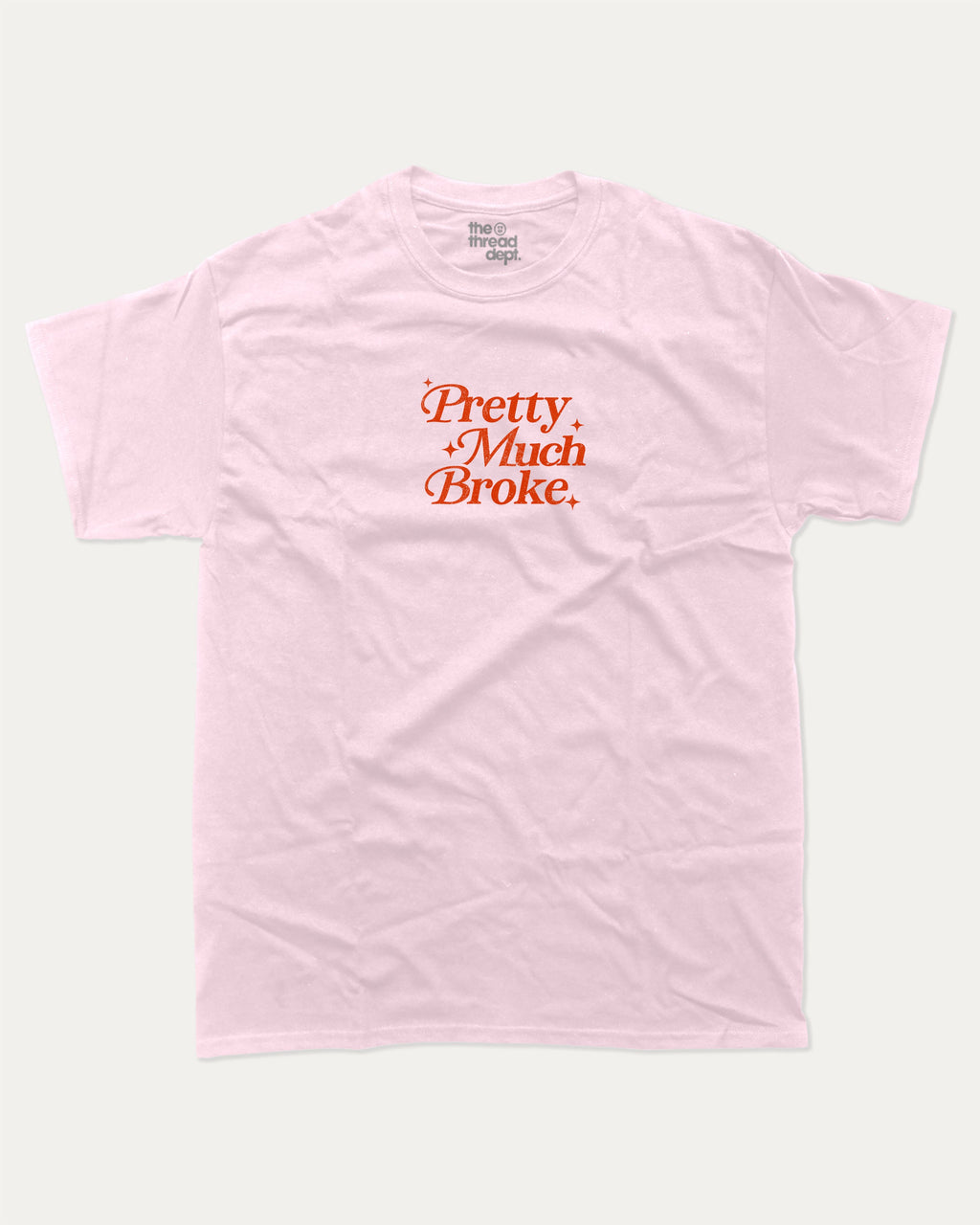 Pretty Much Broke graphic tee with bold and humorous print, funny and trendy graphic. Perfect for adults and gift-giving. Pink shirt.