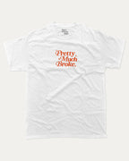 Pretty Much Broke graphic tee with bold and humorous print, funny and trendy graphic. Perfect for adults and gift-giving. White shirt.
