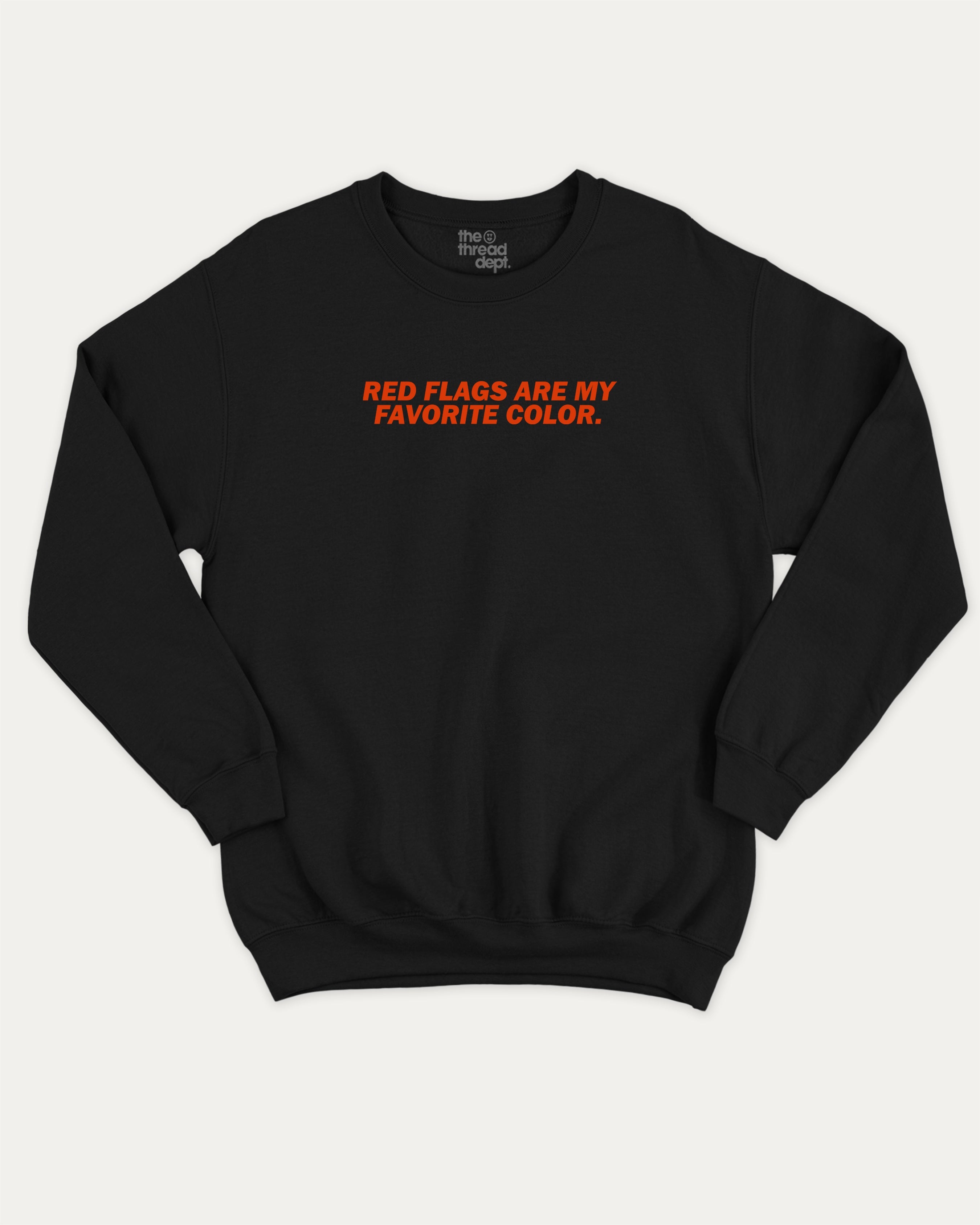 Red Flags Are My Favorite Color graphic sweatshirt with bold and humorous print, warm and cozy graphic for everyday wear. Perfect for adults and gift-giving. Black pullover.