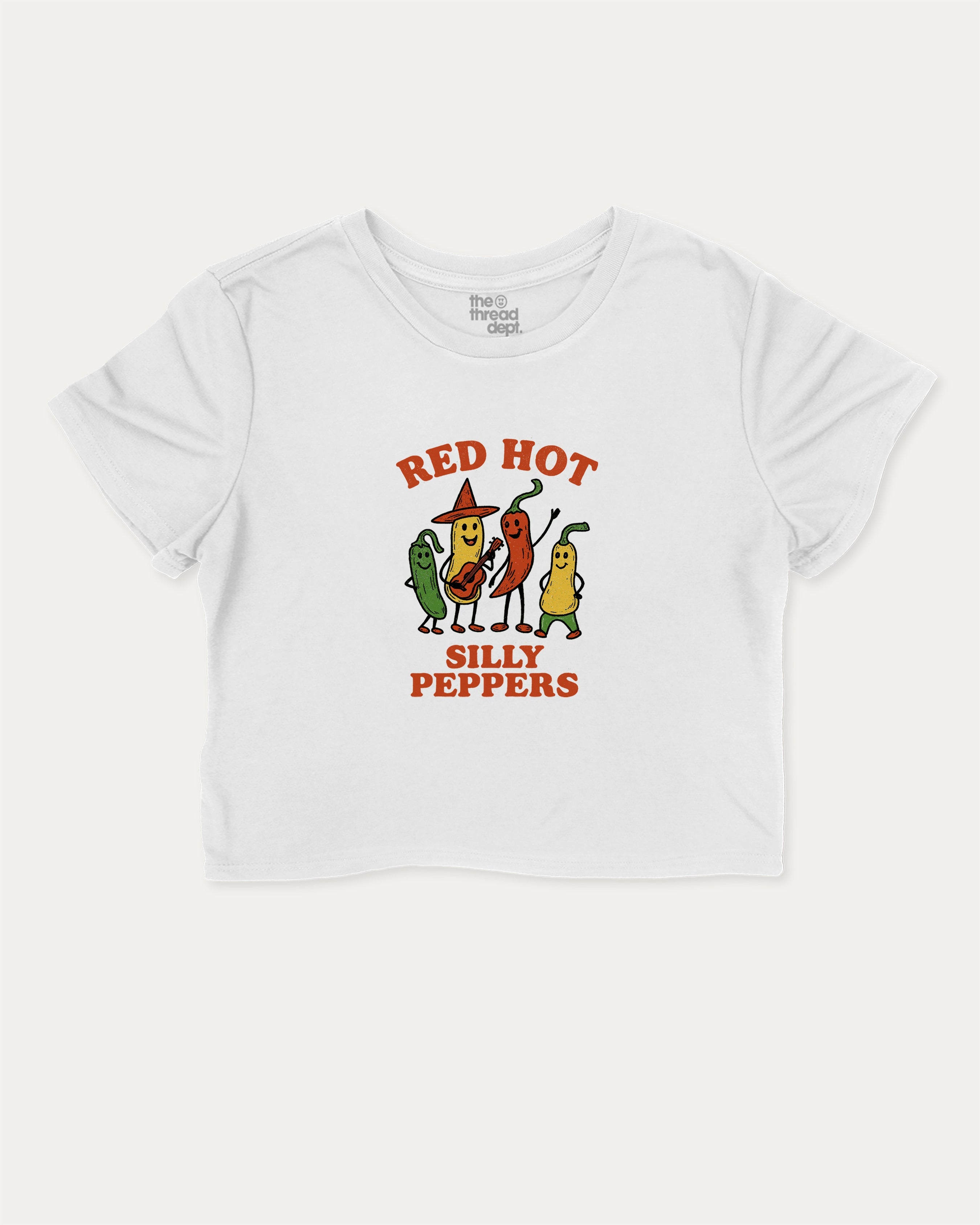 Red Hot Silly Peppers graphic crop tee with funny and trendy slogan print, perfect for women’s casual looks or layering. White crop t-shirt.