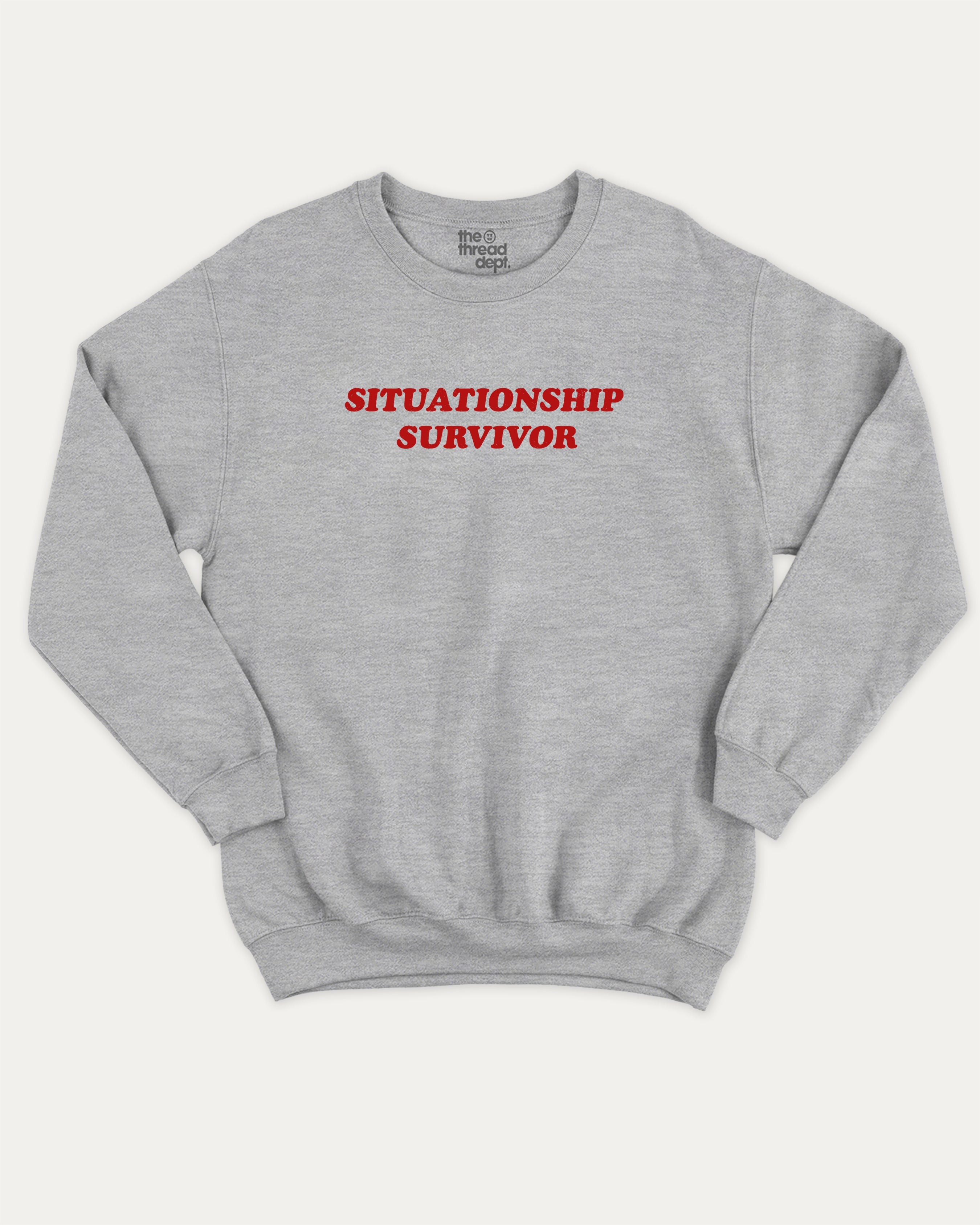 Situationship Survivor graphic sweatshirt with bold and humorous print, warm and cozy graphic for everyday wear. Perfect for adults and gift-giving. Heather Grey pullover.