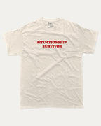 Situationship Survivor graphic tee with bold and humorous print, funny and trendy graphic. Perfect for adults and gift-giving. Cream shirt.