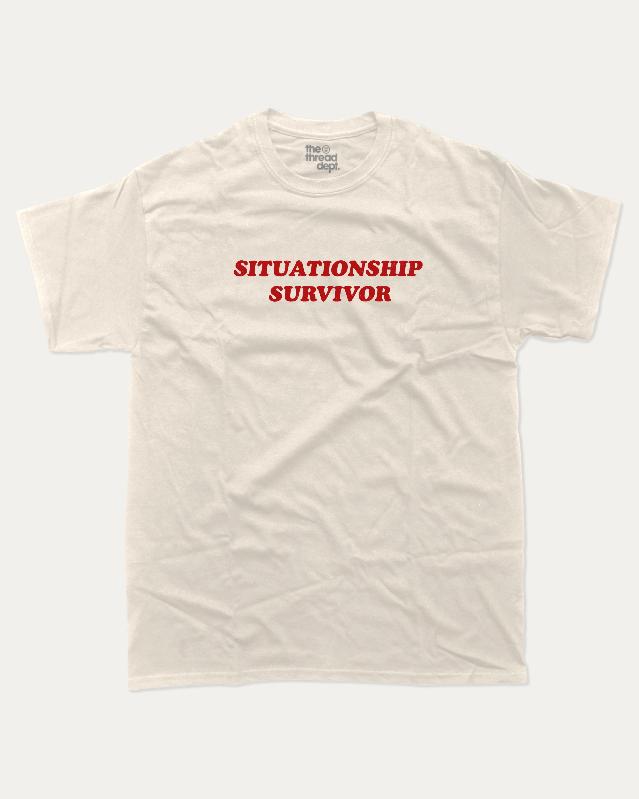 Situationship Survivor graphic tee with bold and humorous print, funny and trendy graphic. Perfect for adults and gift-giving. Cream shirt.