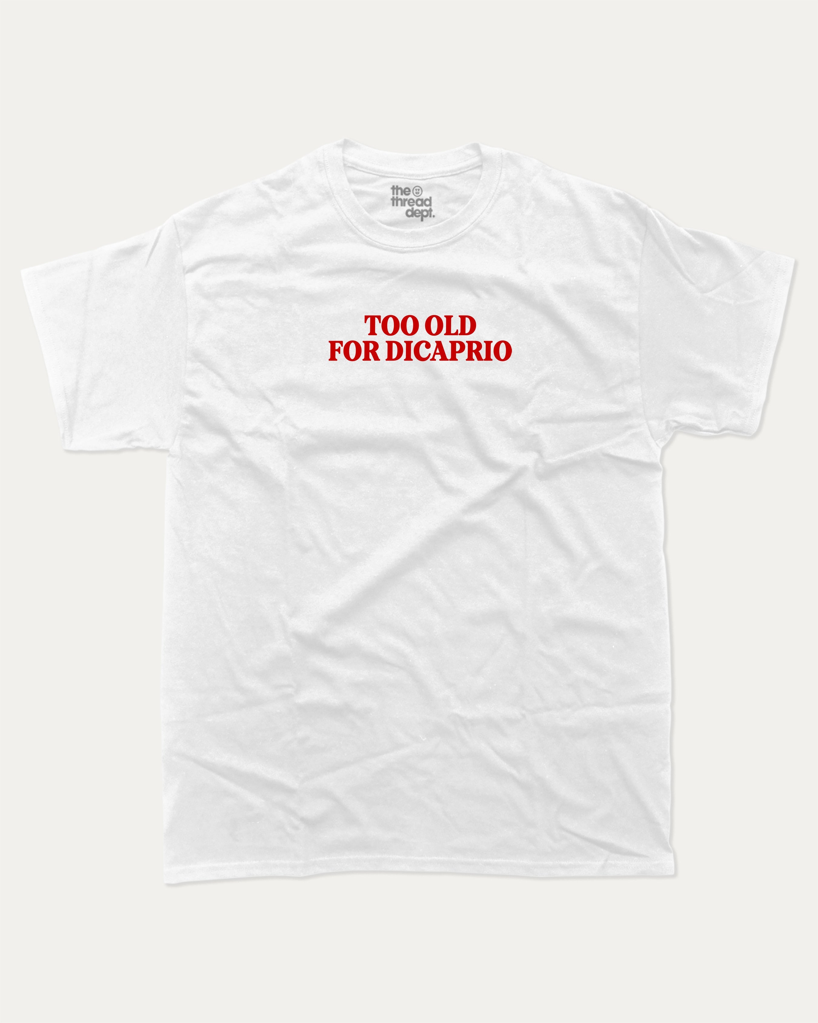 Too Old For Dicaprio graphic tee with bold and humorous print, funny and trendy graphic. Perfect for adults and gift-giving. White shirt.