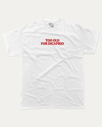 Too Old For Dicaprio graphic tee with bold and humorous print, funny and trendy graphic. Perfect for adults and gift-giving. White shirt.