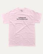 Undiagnosed But I'm Pretty Sure graphic t-shirt, perfect for adults. Funny mental health tee, trending meme shirt, unique gift idea. Pink.