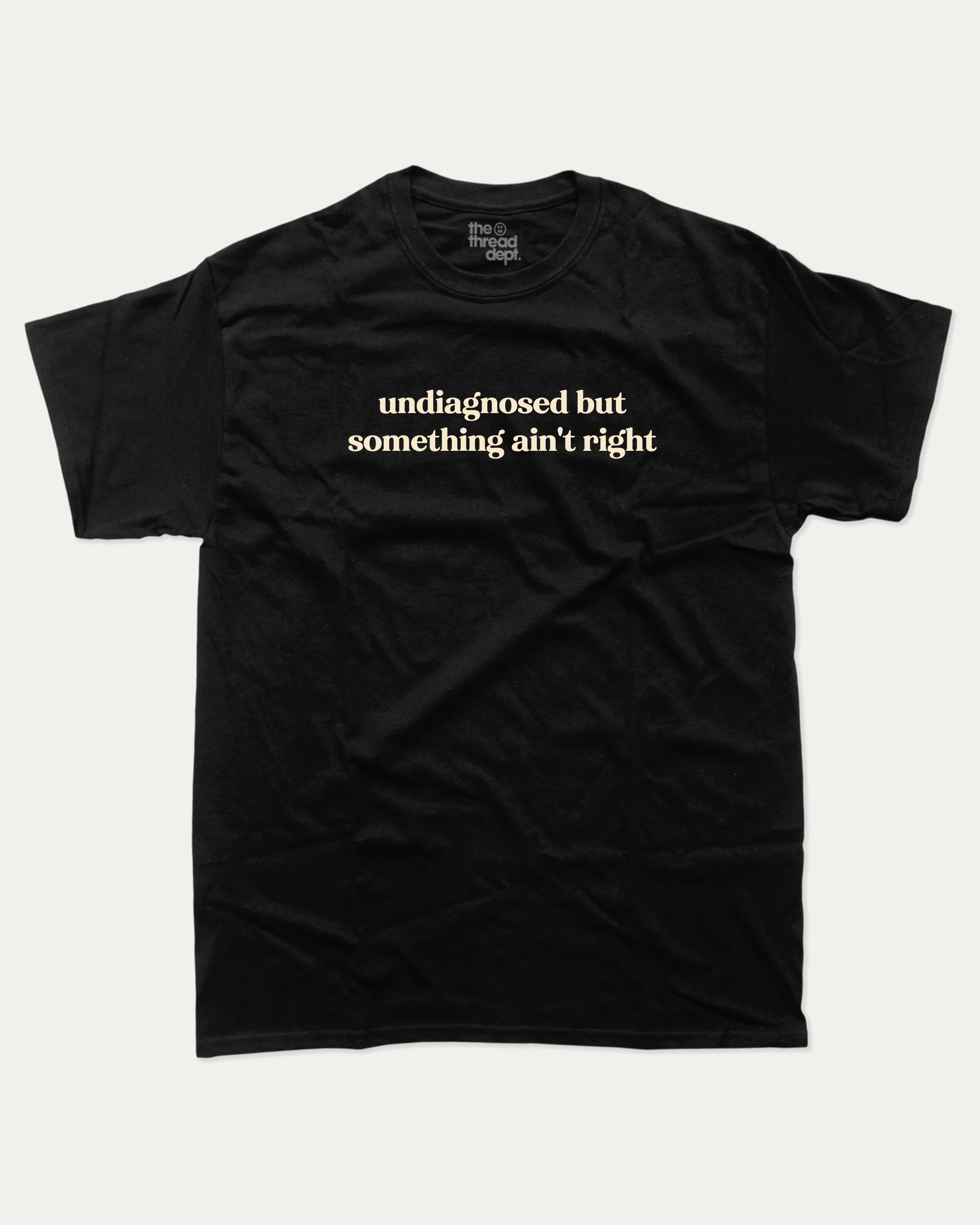 Undiagnosed But Something Ain't Right graphic t-shirt, perfect for adults. A must-have funny tee, trending meme shirt, unique gift idea. Black.