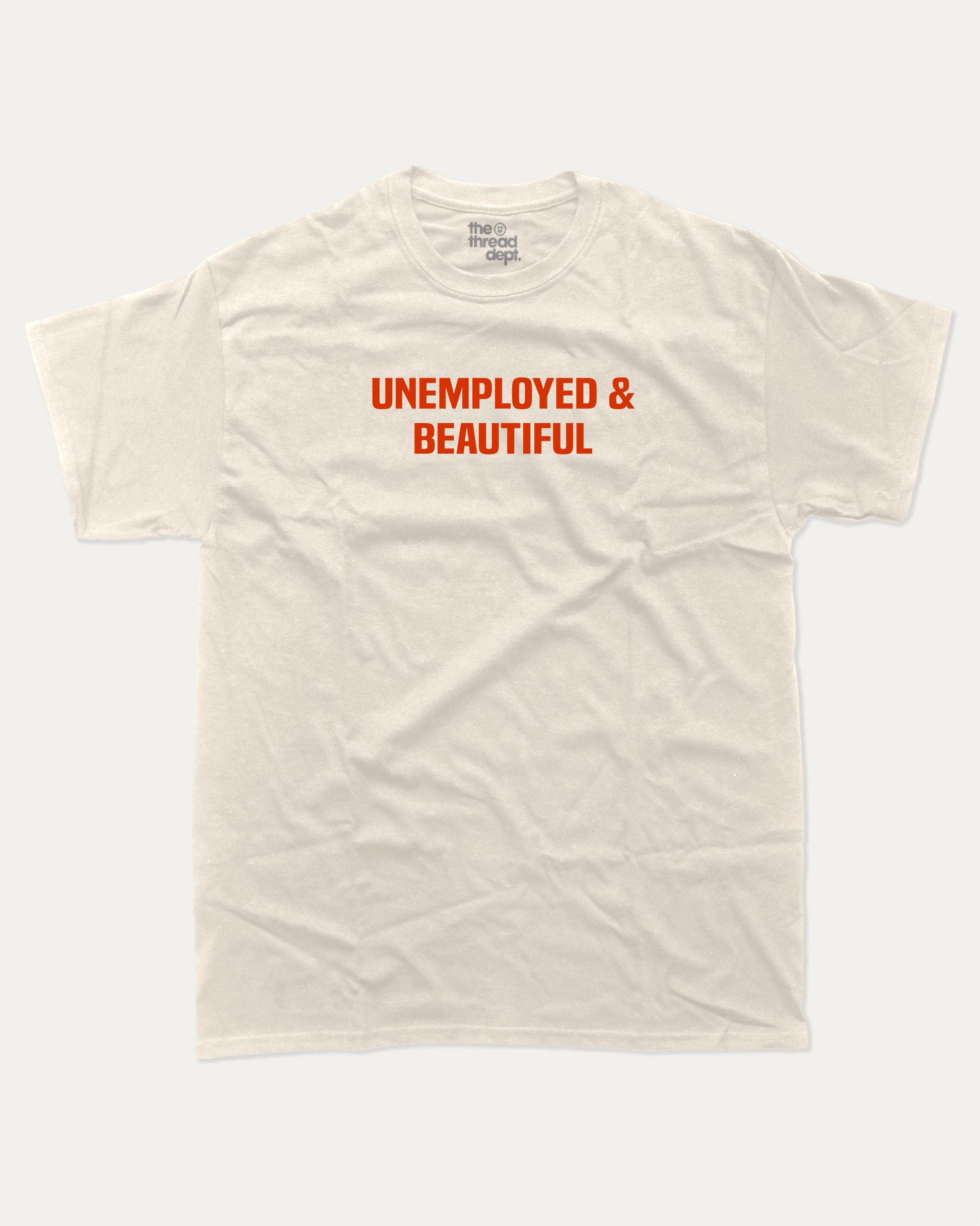 Unemployed and Beautiful graphic t-shirt, Pun Graphic T shirt, Funny Words T shirt, Humorous Graphic T shirt, A must-have funny tee, trending meme shirt, unique gift idea. Cream.