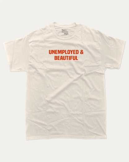 Unemployed and Beautiful graphic t-shirt, Pun Graphic T shirt, Funny Words T shirt, Humorous Graphic T shirt, A must-have funny tee, trending meme shirt, unique gift idea. Cream.
