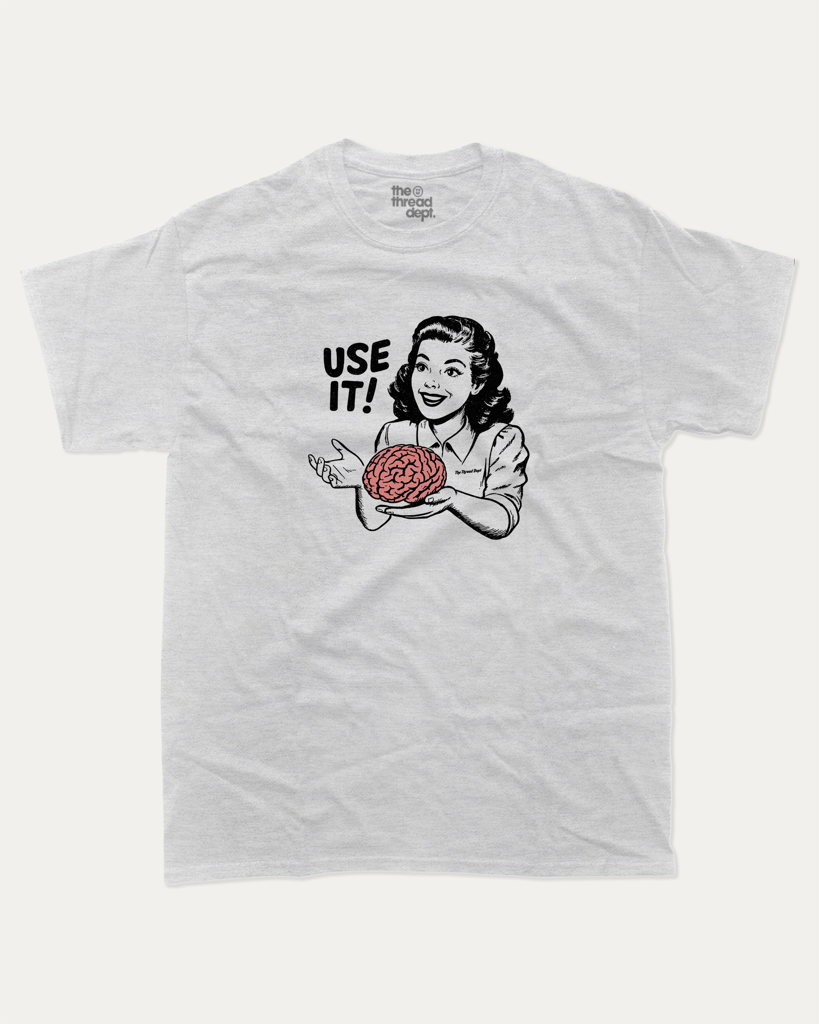 Use Your Brain graphic tee with retro 70s and humorous print, funny and trendy graphic. Perfect for adults and gift-giving. Ash Grey shirt.