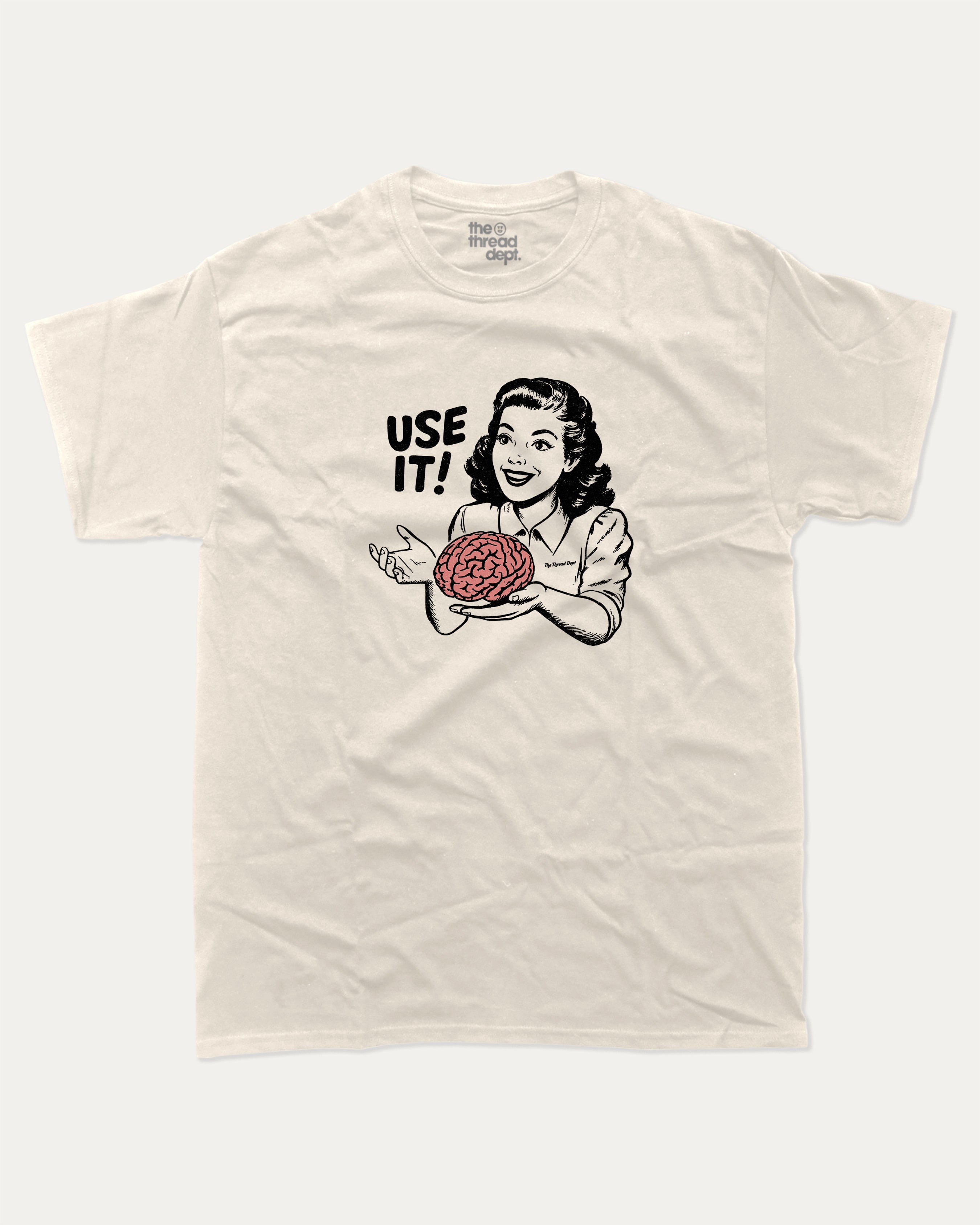 Use Your Brain graphic tee with retro 70s and humorous print, funny and trendy graphic. Perfect for adults and gift-giving. Cream shirt.