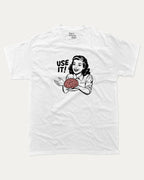 Use Your Brain graphic tee with retro 70s and humorous print, funny and trendy graphic. Perfect for adults and gift-giving. White shirt.