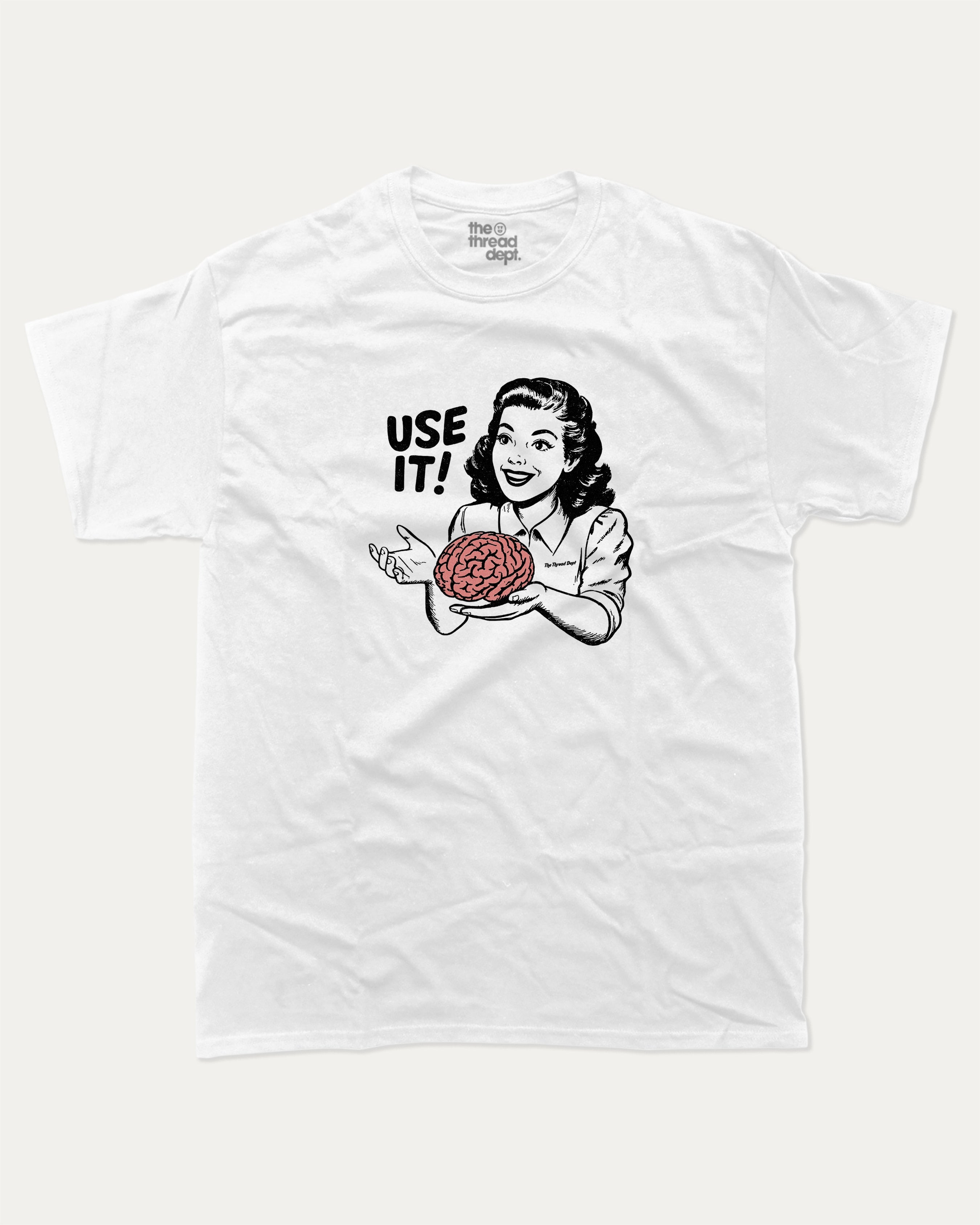 Use Your Brain graphic tee with retro 70s and humorous print, funny and trendy graphic. Perfect for adults and gift-giving. White shirt.