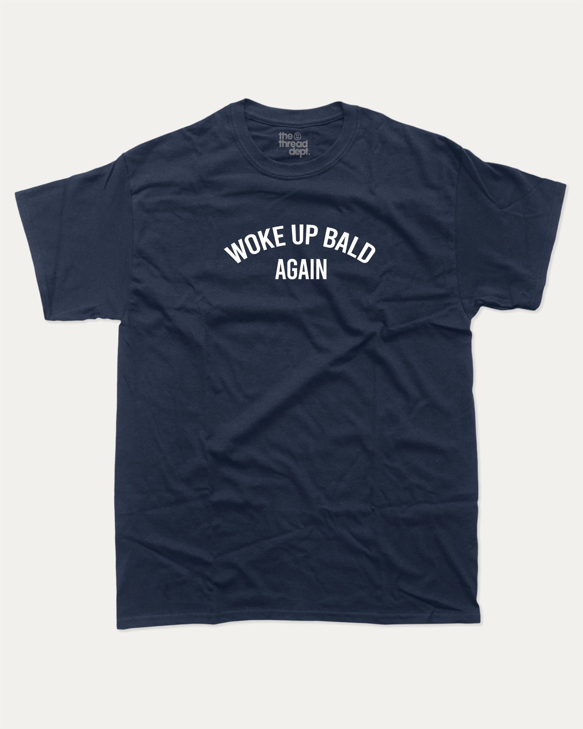 Woke Up Bald Again graphic tee with bold and humorous print, funny and trendy graphic. Perfect for adults and gift-giving. True Navy shirt.