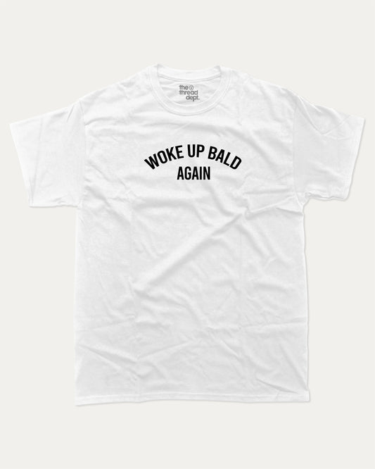 Woke Up Bald Again graphic tee with bold and humorous print, funny and trendy graphic. Perfect for adults and gift-giving. White shirt.