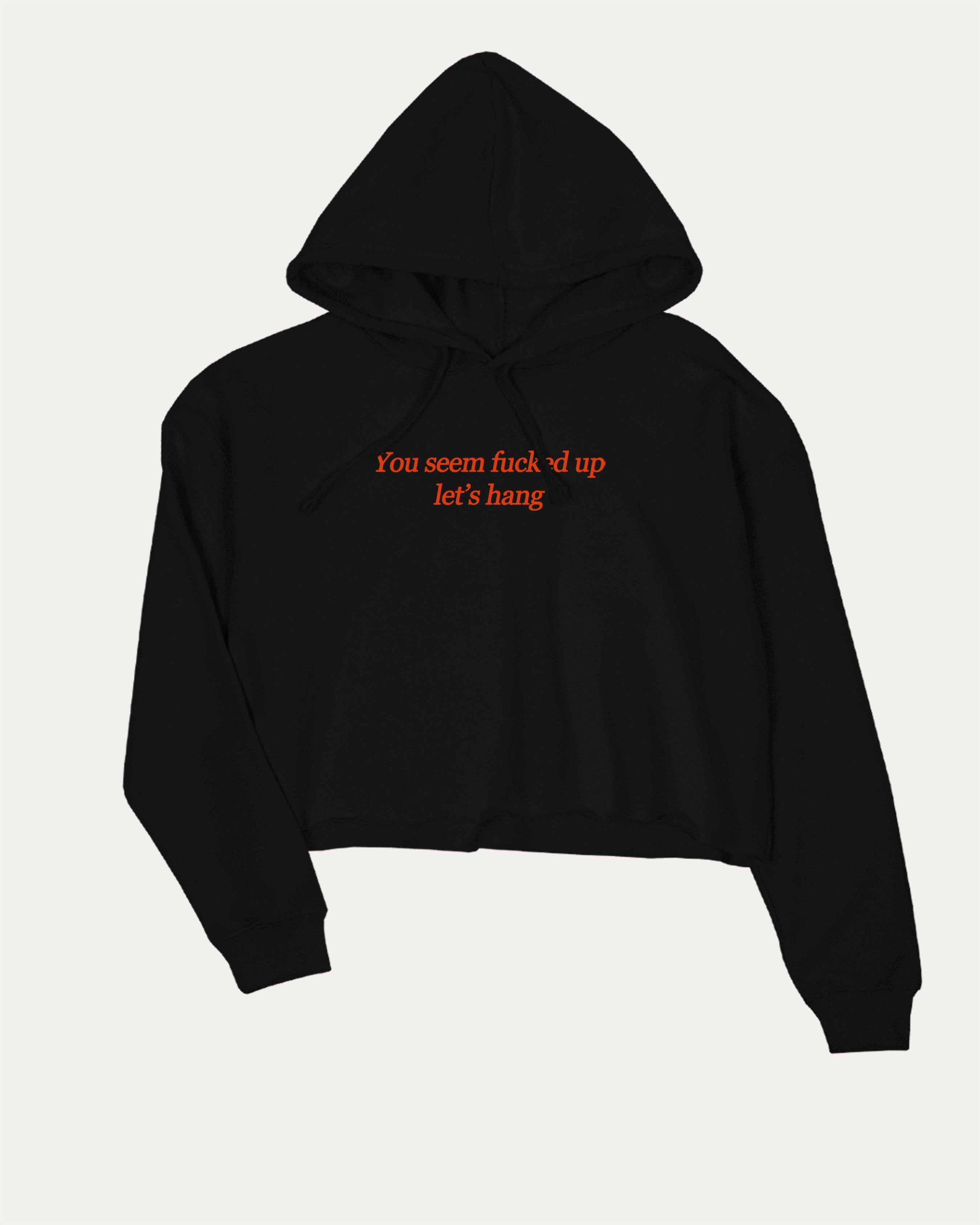 You seem fucked up let's hang graphic crop hoodie with bold slogan print, stylish and playful design for women. Ideal for gifting and casual looks. Black crop top..