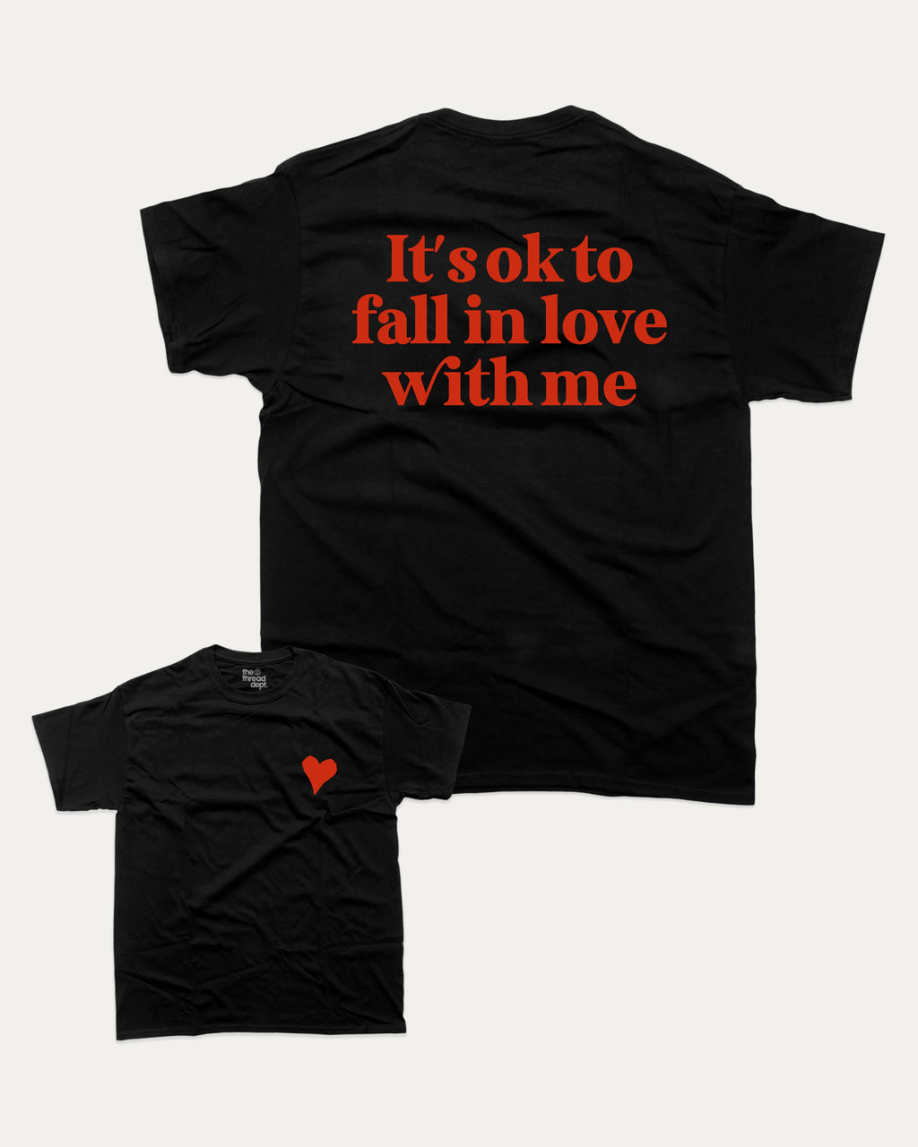 It's ok to fall in love with me graphic tee with bold and humorous print, Valentine Day Graphic T shirt, Perfect Gift for Valentine's Day, funny and trendy graphic. Perfect for adults and gift-giving. Black shirt.