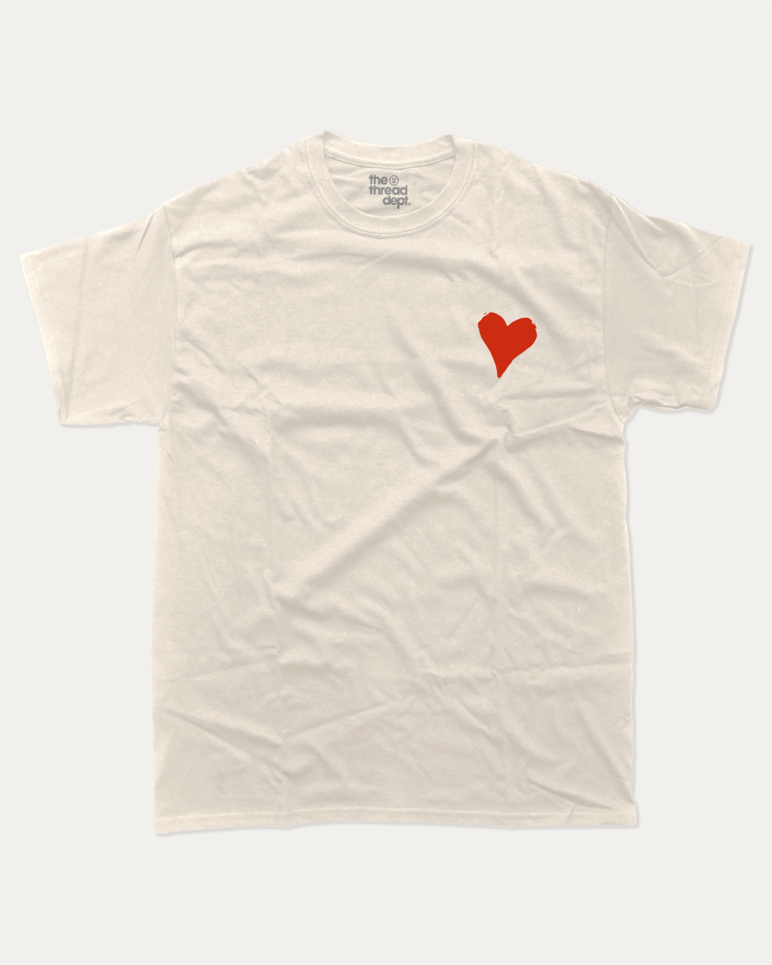 It's ok to fall in love with me graphic tee with bold and humorous print, Valentine Day Graphic T shirt, Perfect Gift for Valentine's Day, funny and trendy graphic. Perfect for adults and gift-giving. Cream shirt.