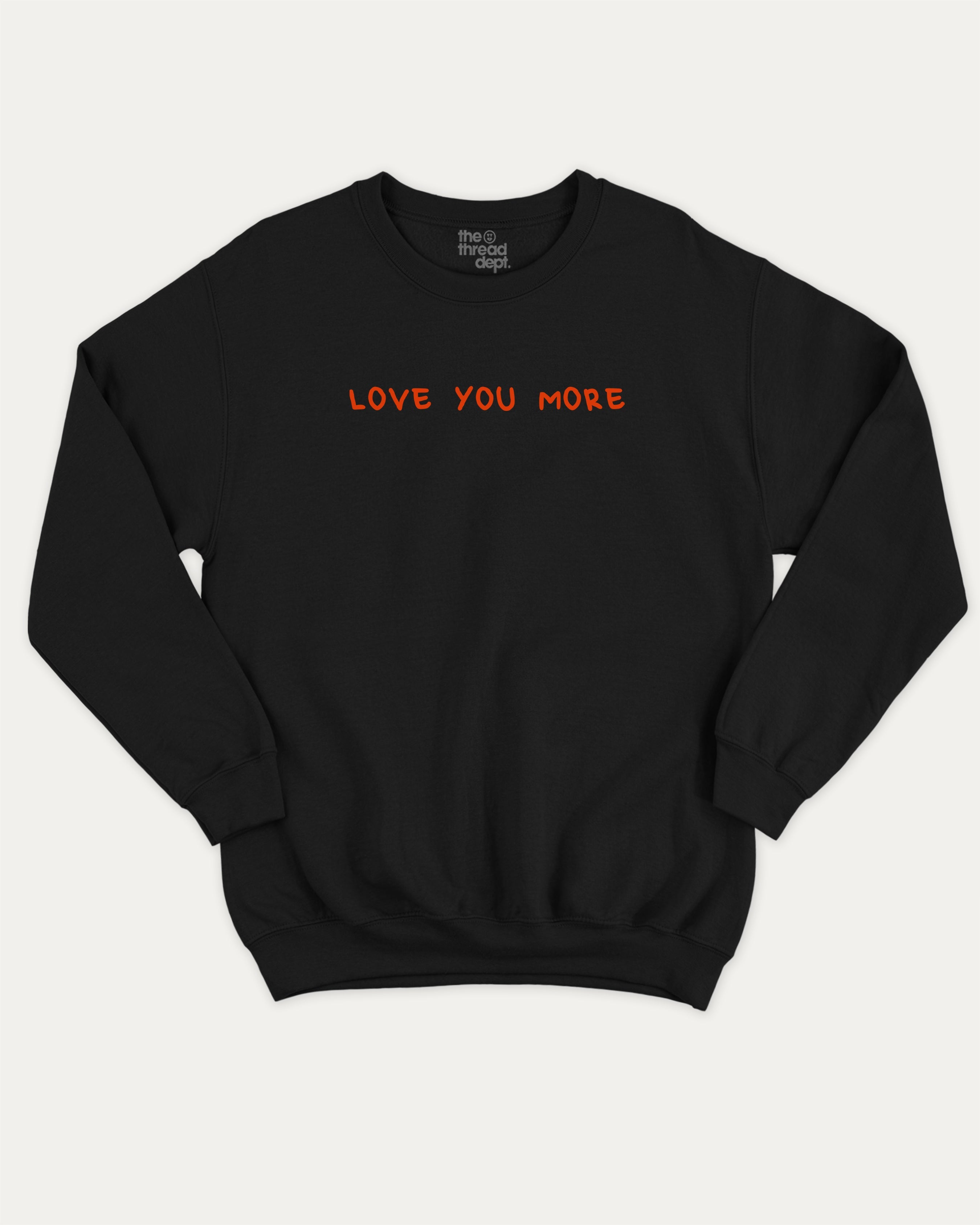 Love You More graphic sweatshirt with bold and humorous print, warm and cozy graphic for everyday wear. Perfect for adults and gift-giving. Black pullover.