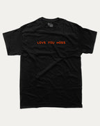 Love You More graphic tee with funny valentine print, trendy love graphic. Perfect for Valentine's Day gift-giving. Black shirt.