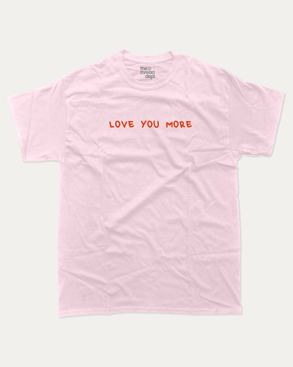 Love You More graphic tee with funny valentine print, trendy love graphic. Perfect for Valentine's Day gift-giving. Pink shirt.