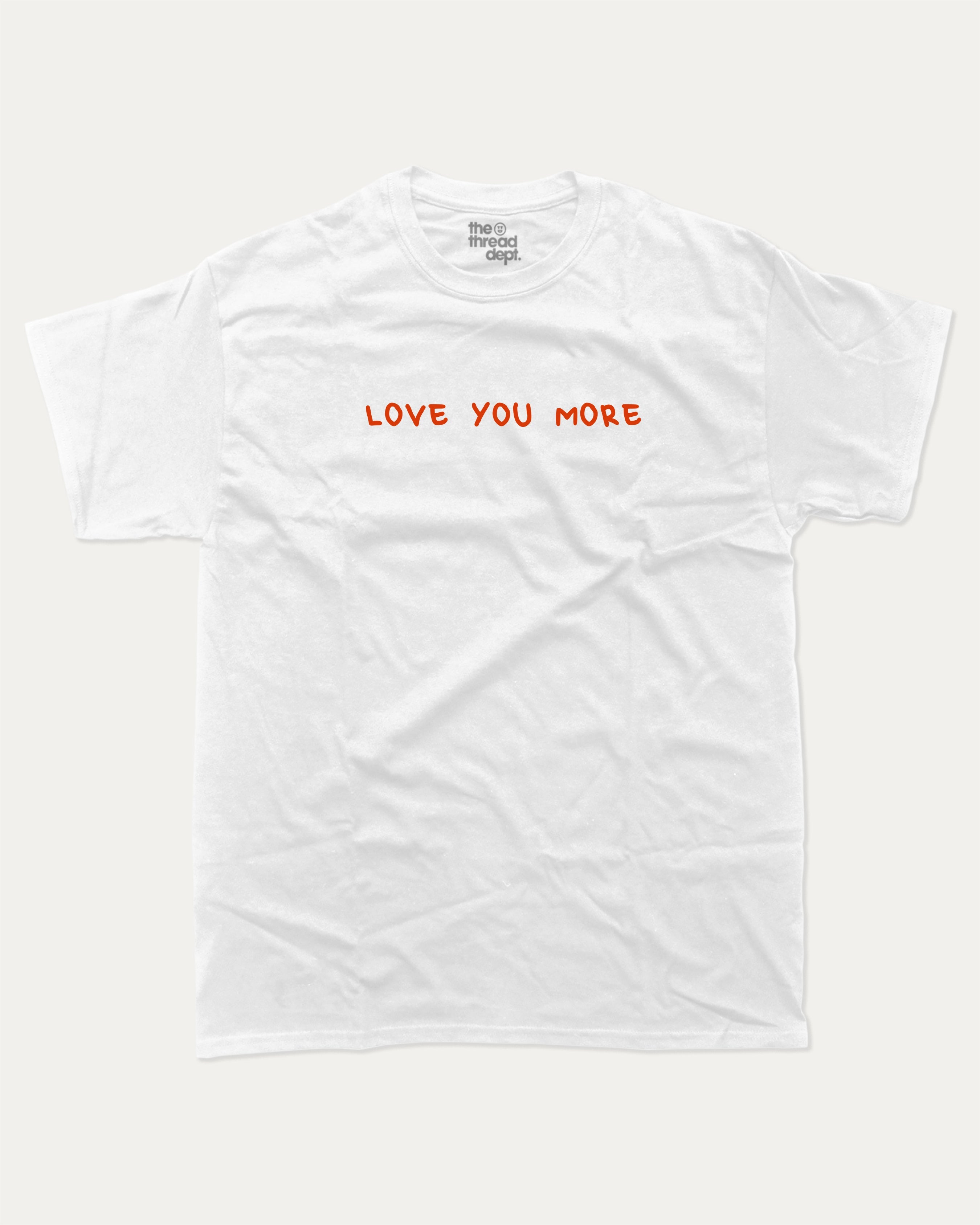 Love You More graphic tee with funny valentine print, trendy love graphic. Perfect for Valentine's Day gift-giving. White shirt.