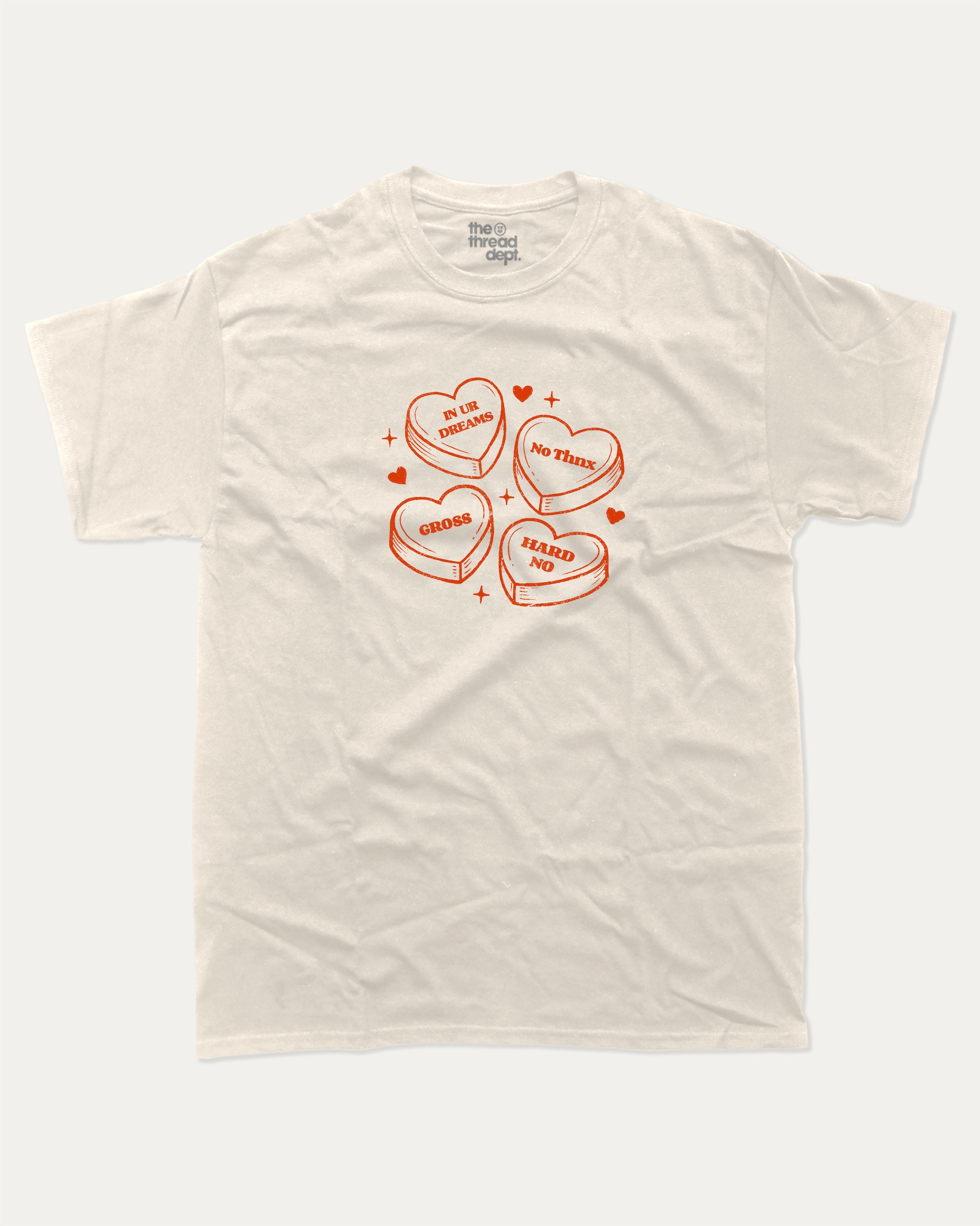 Sarcastic Candy Hearts graphic tee with funny valentine print, trendy love graphic. Perfect for Valentine's Day gift-giving. Cream shirt.