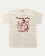 Valentine's Day graphic tee with funny valentine print, trendy love graphic. Perfect for Valentine's Day gift-giving. Cream shirt.