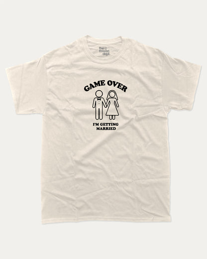 Game Over I'm Getting Married graphic t-shirt, perfect for adults. A must-have funny marriage tee, trending meme shirt, unique gift idea. Cream.